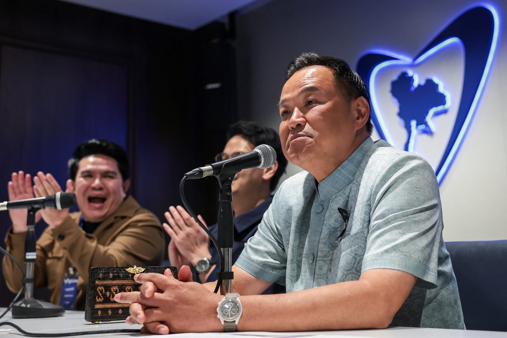 Thailand's caretaker PM Anutin Charnvirakul attends a meeting with Bhumjaithai Party members at party HQ in Bangkok