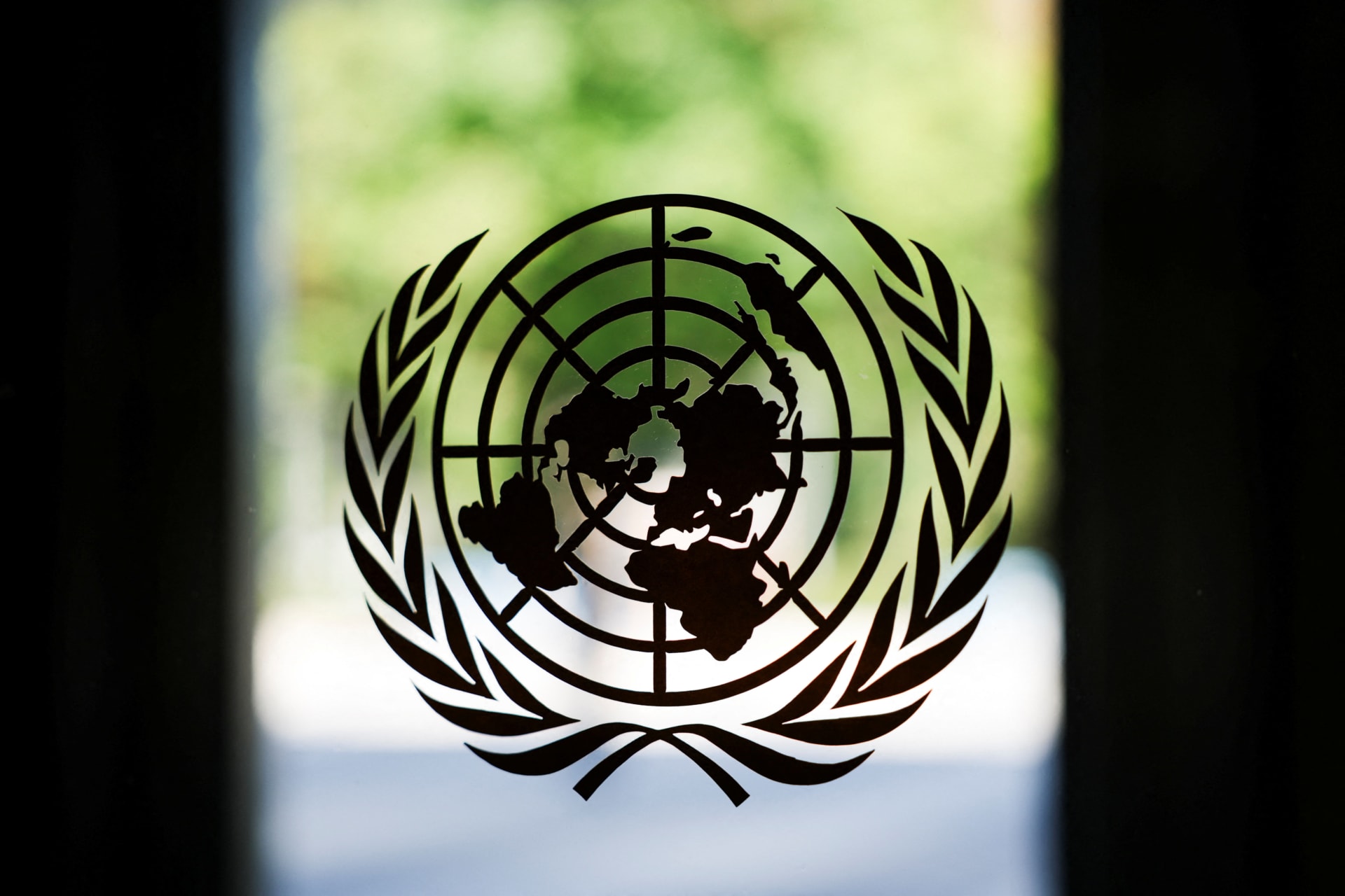 The United Nations logo adorns a window at U.N. headquarters in New York City, U.S., September 18, 2025.
