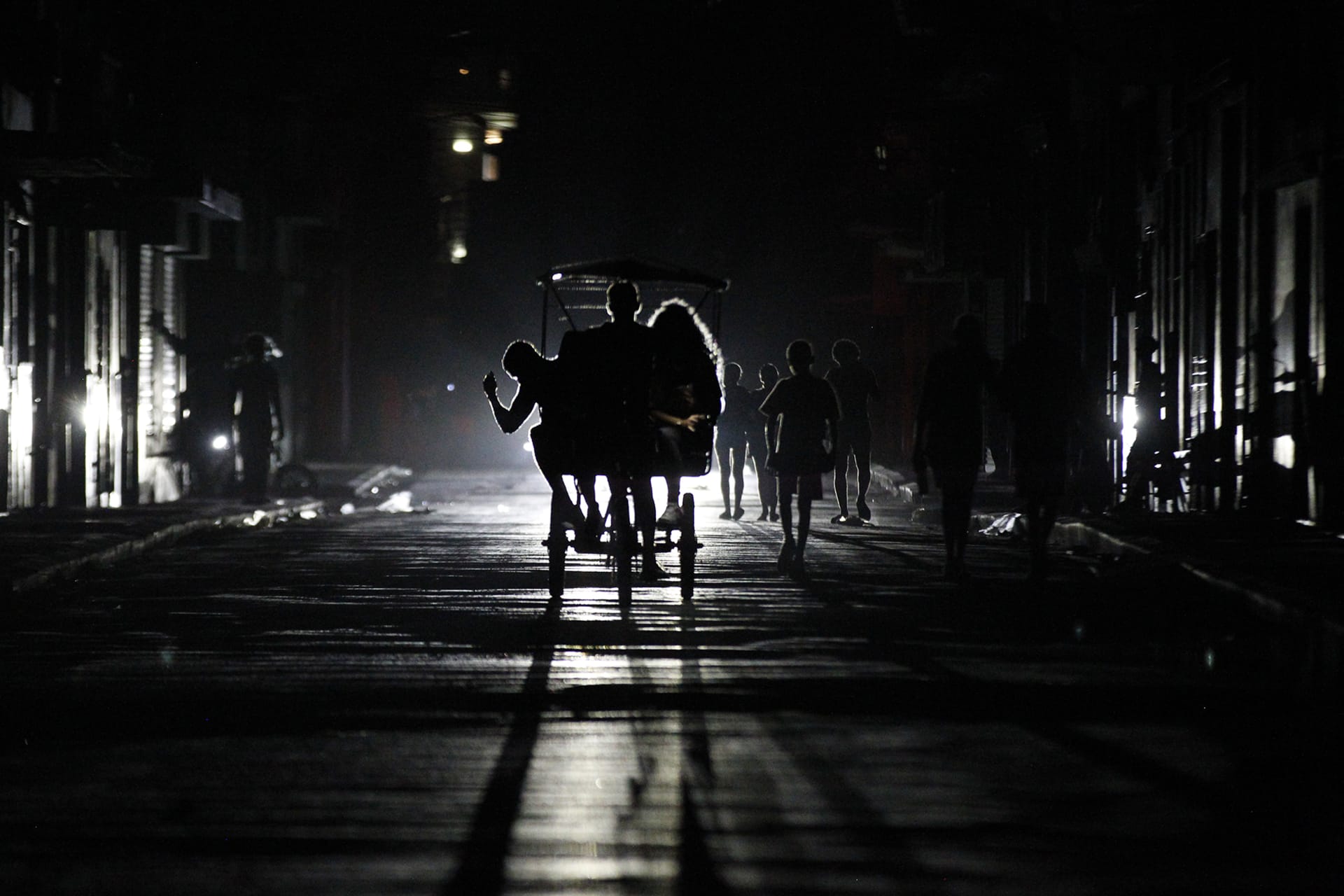 <p>People ride a local taxi down a street during the most recent blackout in Havana, Cuba, on March 21, 2026.</p>
