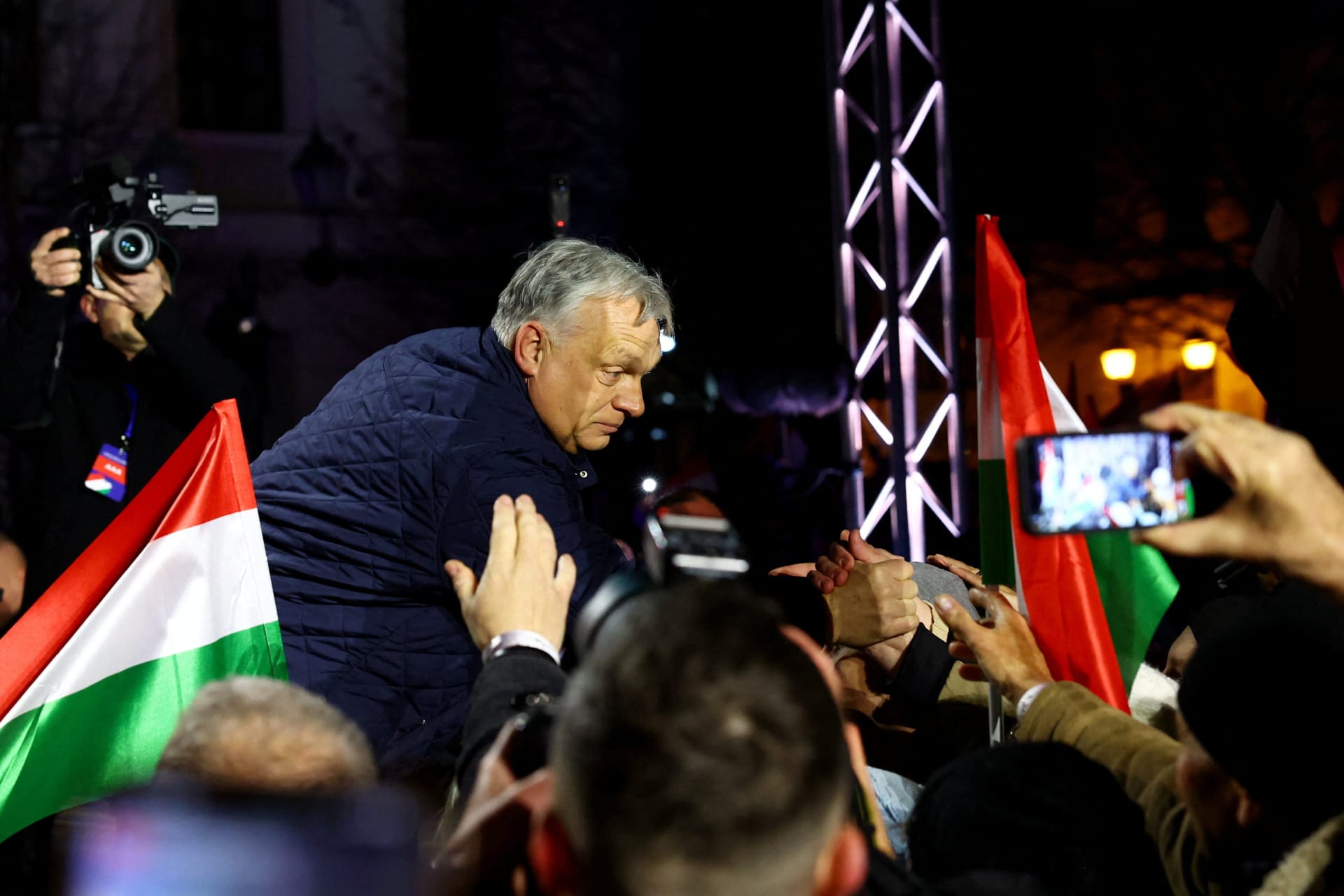 Hungarian Prime Minister Orban greets the supporters during an election campaign rally in Gyor,
