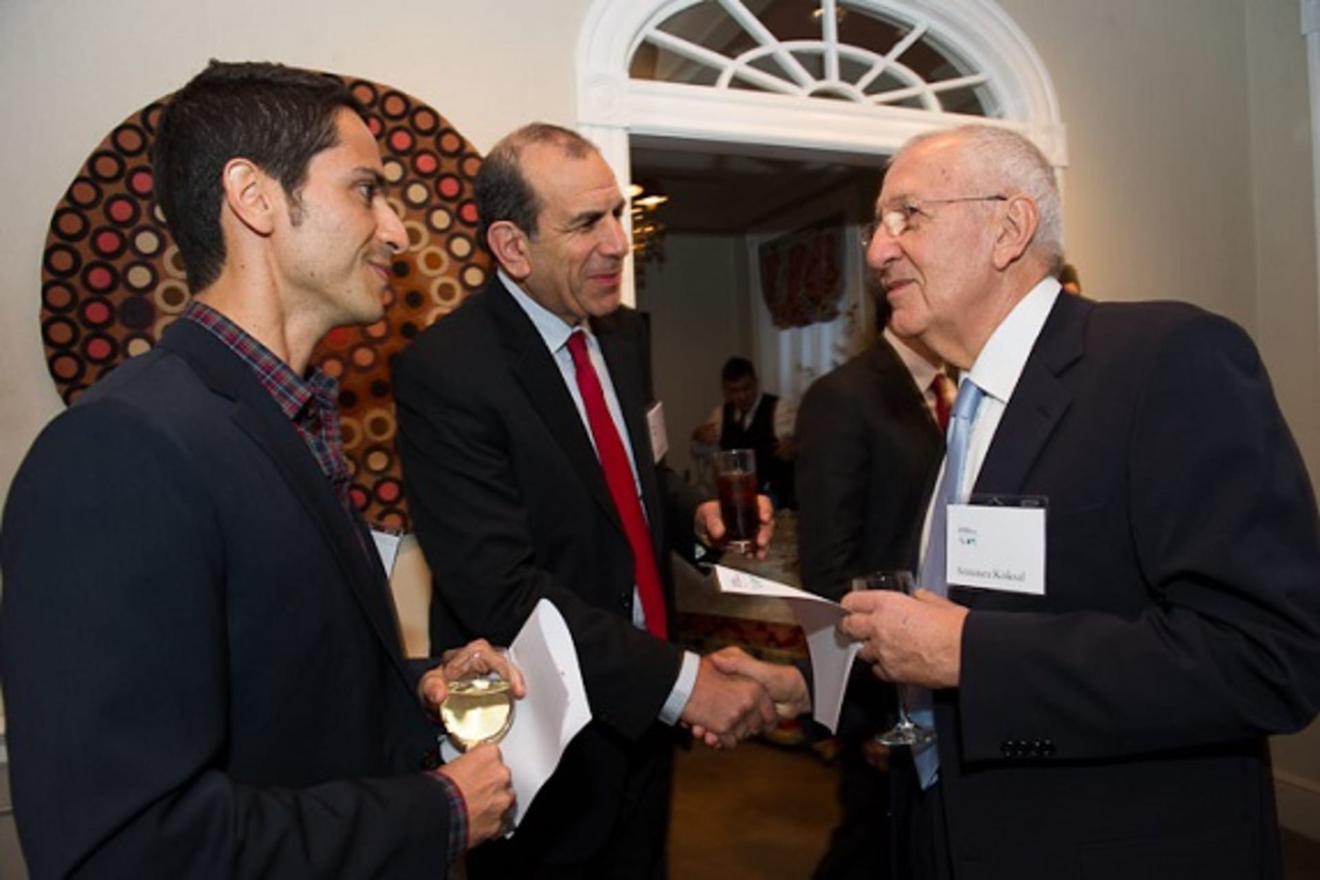 <p>Participants converse during the CoC Second Annual Conference (Kaveh Sardari).</p>
