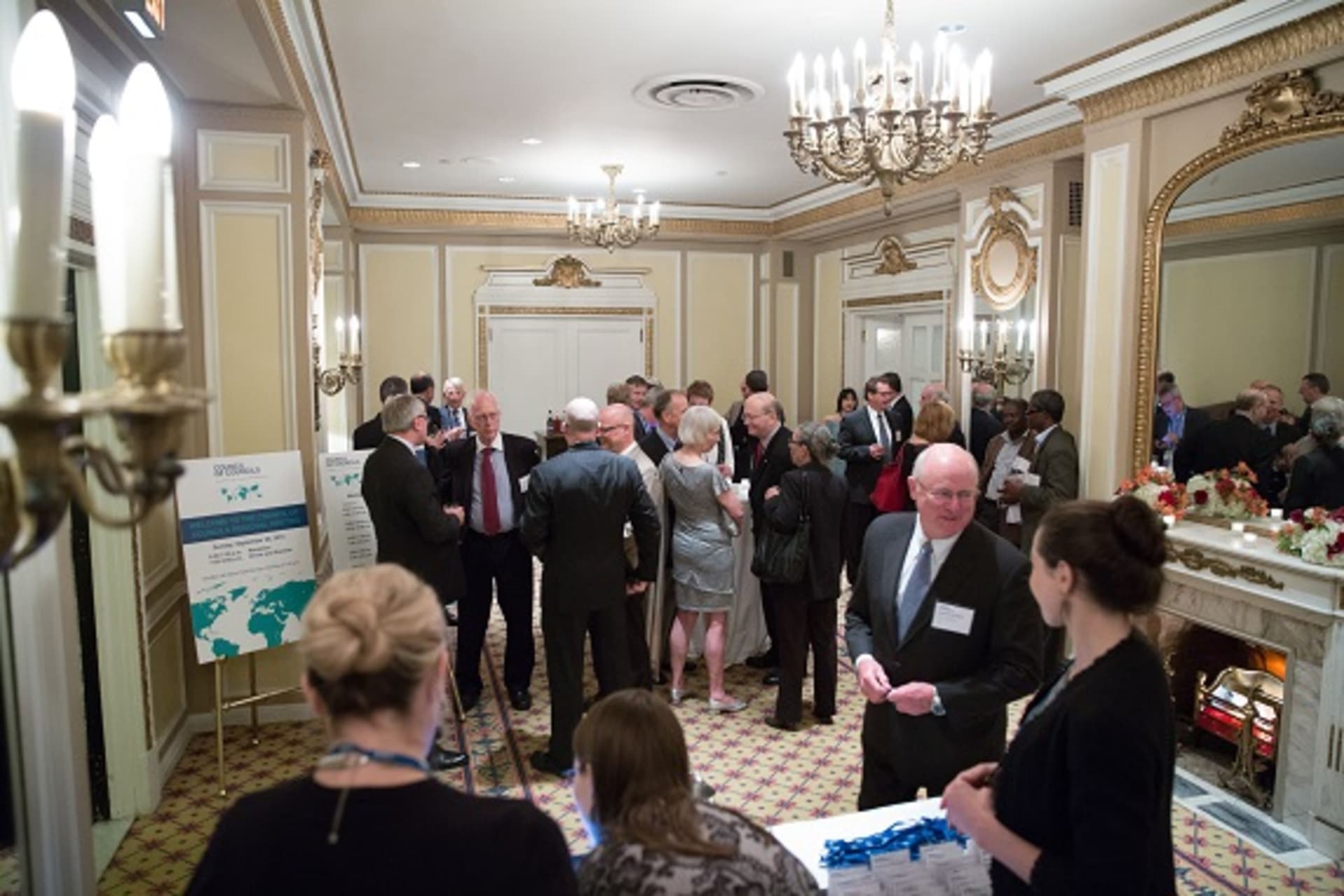 <p>Participants mingle prior to the session on diplomacy in the Artic at the Council of Councils Sixth Regional Conference in Ottawa, Canada (Kris Young).</p>