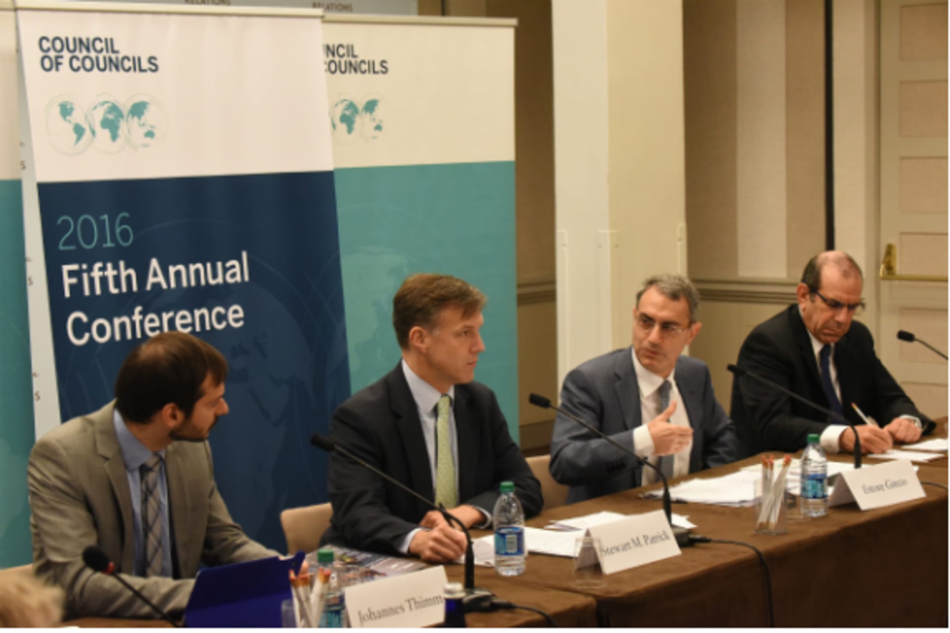 <p>Johannes Thimm, Stewart Patrick, Ettore Greco, and Gilead Sher speak during the CoC Fifth Annual Conference. (Don Pollard)</p>
