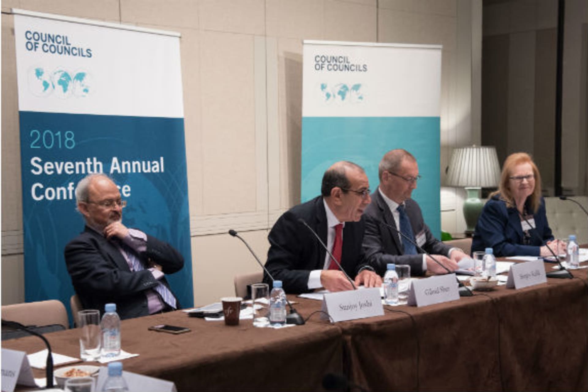 <p>Sunjoy Joshi, Gilead Sher, Sergey Kulik, and Silvia Maciunas discuss how to strengthen effective climate change action (Melanie Einzig).</p>
