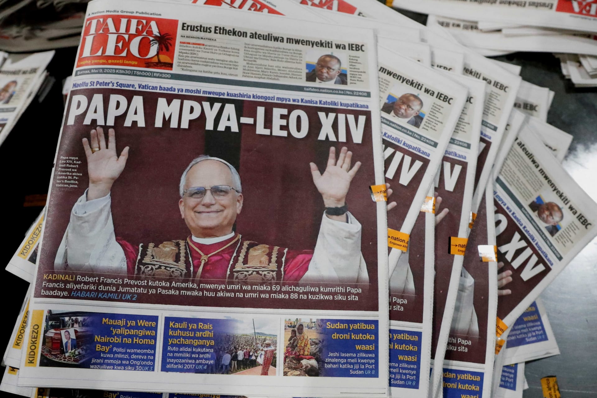 <p>Printed newspapers for circulation are arranged with a picture of the newly elected Pope Leo XIV, Cardinal Robert Prevost of the United States, at the Nation Media Group printing press on the outskirts of Nairobi, Kenya, on May 8, 2025.</p>

