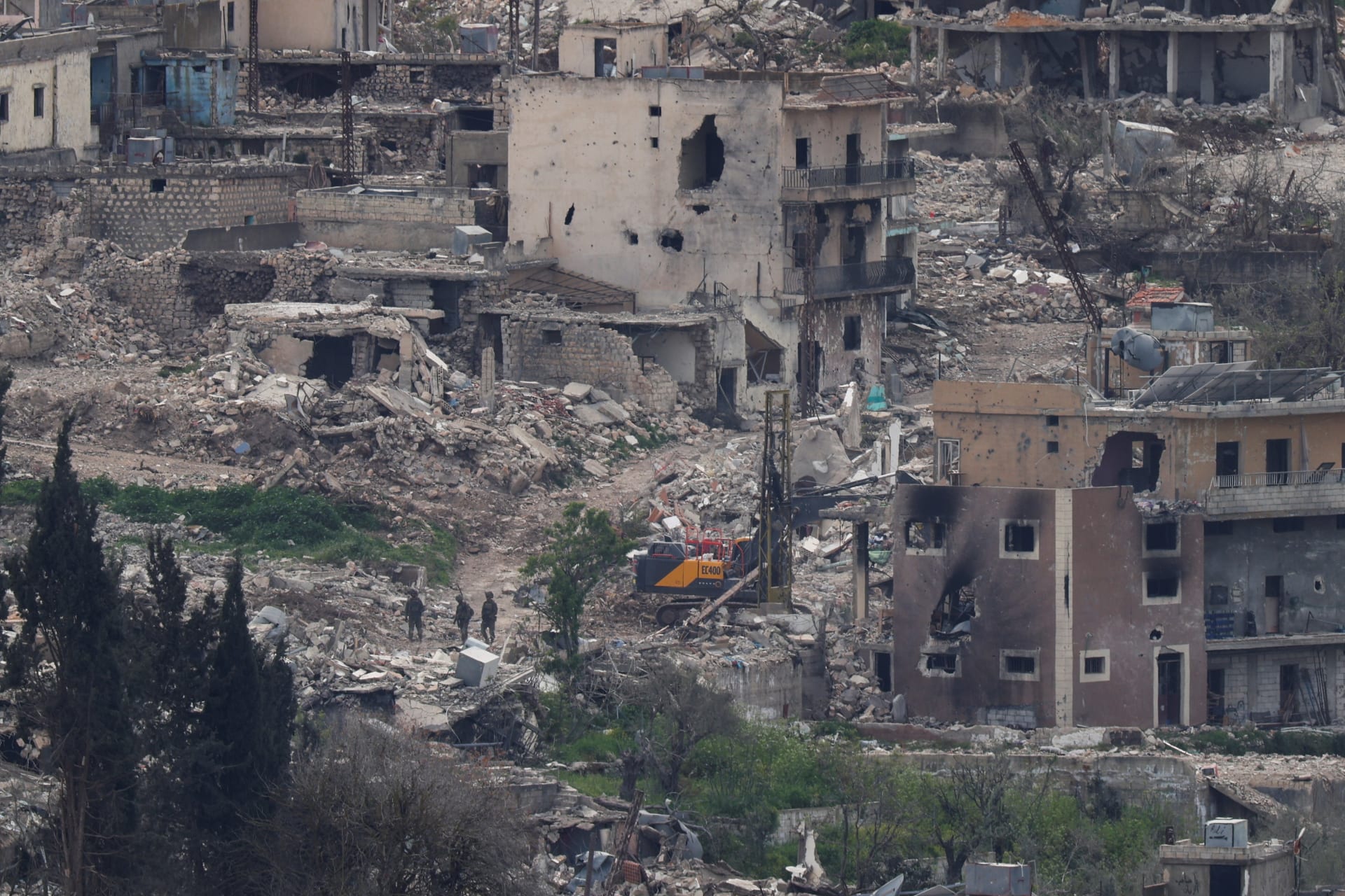 <p>Israeli soldiers stand among destroyed buildings in southern Lebanon, April 14, 2026.</p>
