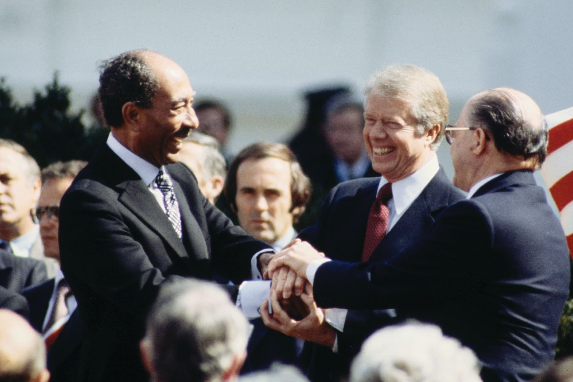 U.S. President Jimmy Carter shakes hands with Egyptian President Anwar Sadat at the signing of the Egyptian-Israeli Peace Treaty at the White House.