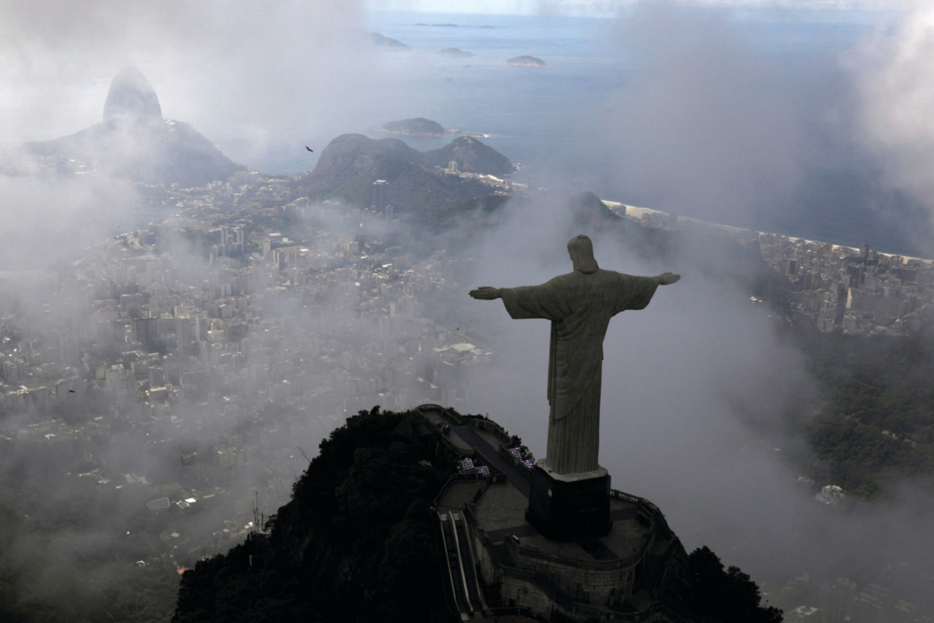 An aerial view shows the Christ the Redeemer statue, in Rio de Janeiro, Brazil on a foggy day.