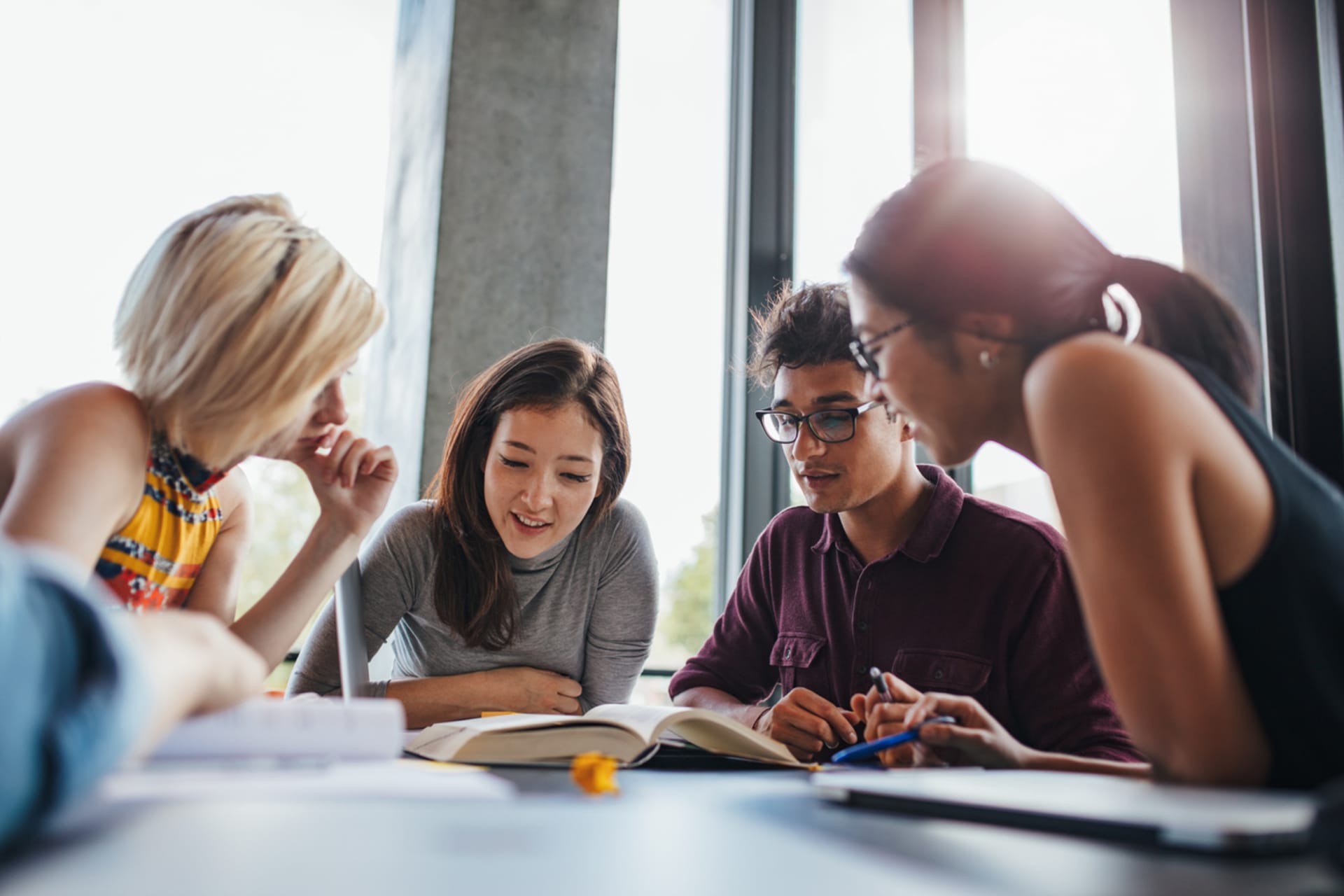 Students studying at a table