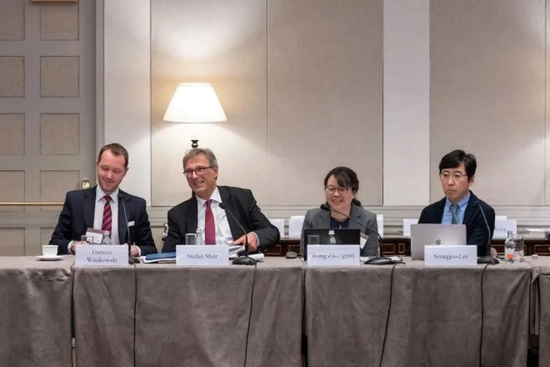 <p>Damian Wnukowski, Stefan Mair, Wang Zhongmei, and Seungjoo Lee during the session “Revitalizing the World Trade Organization”</p>