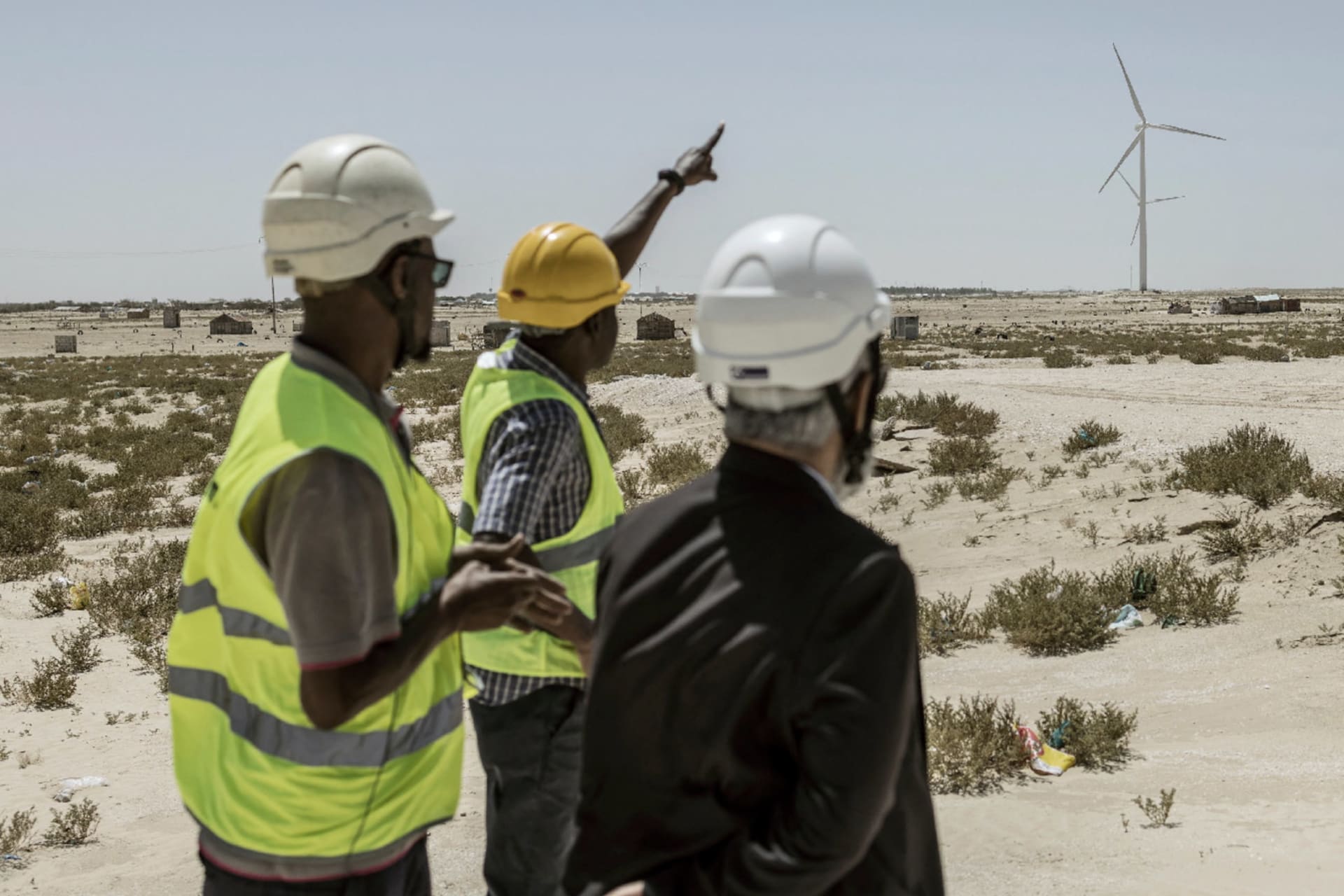 Technical managers discuss operations at a wind farm plant that is helping advance Mauritania’s goal of reaching half renewable energy by 2030 in Nouakchott, Mauritania