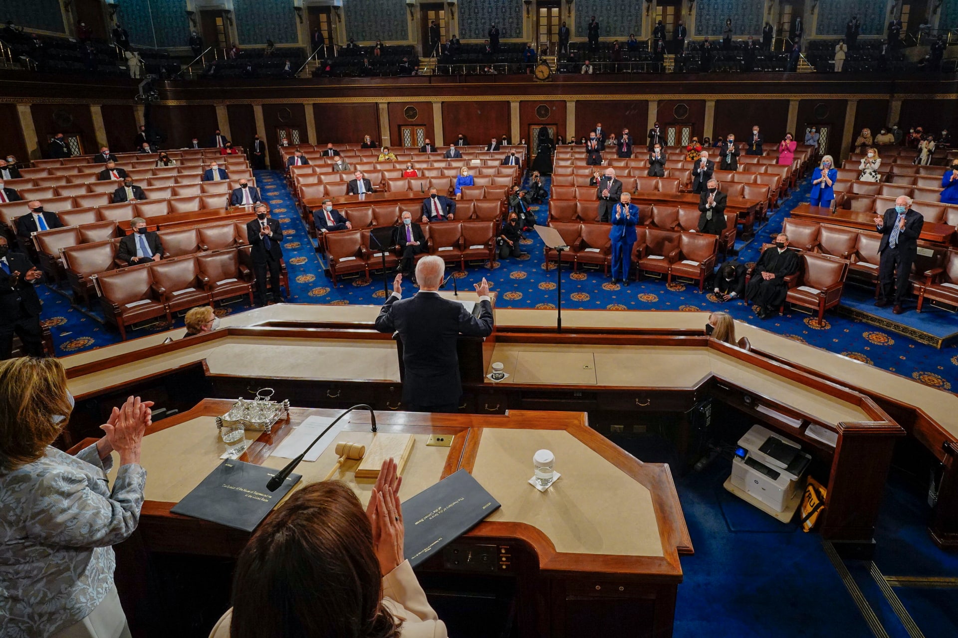 President Joe Biden addresses a joint session of Congress, with Vice President Kamala Harris and House Speaker Nancy Pelosi on the dais behind him at the US Capitol in Washington, DC, on April 28, 2021.