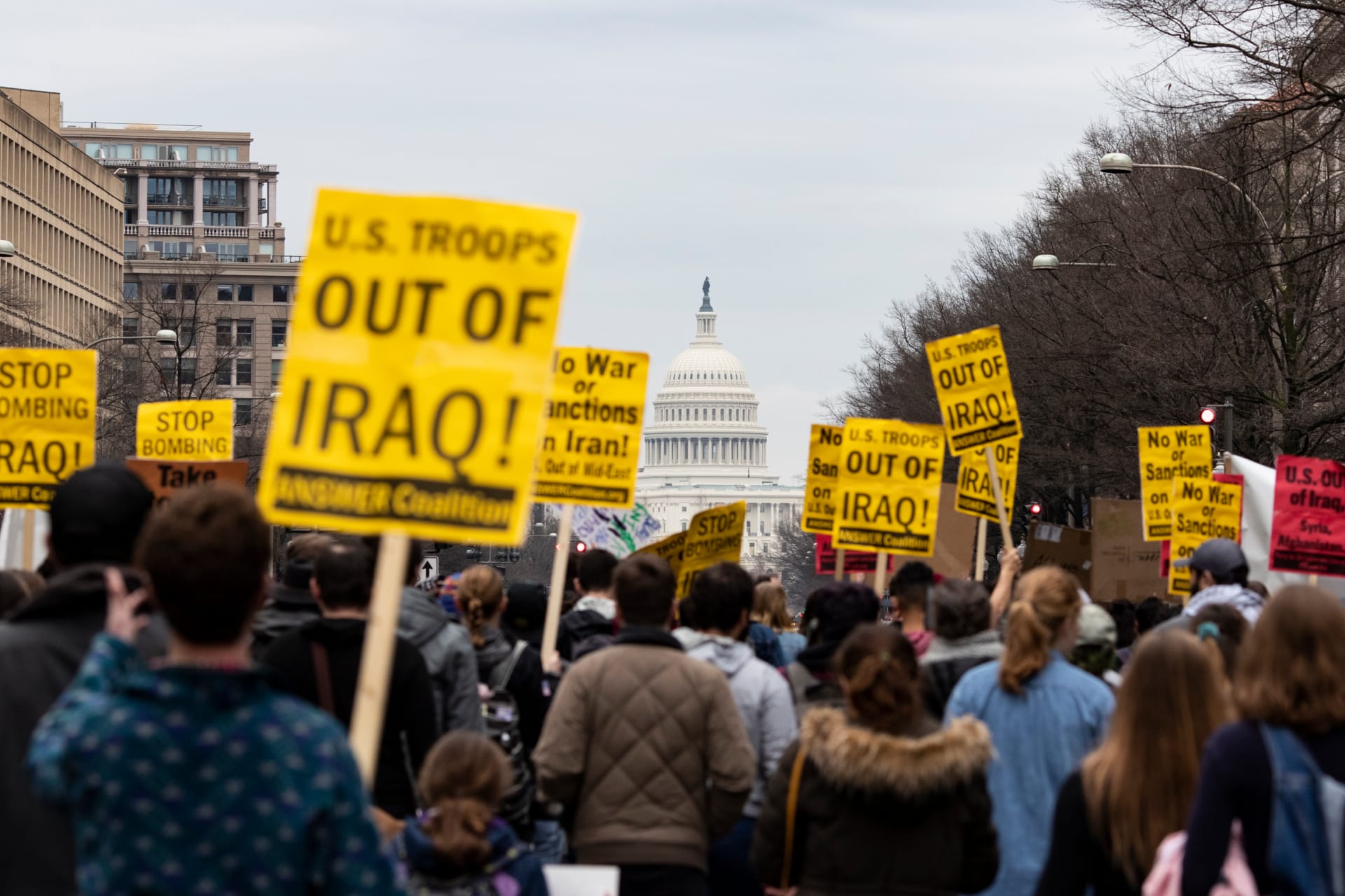 Anti-war demonstrators march during a demonstration against war in Iraq and Iran on January 4, 2020 in Washington, DC.