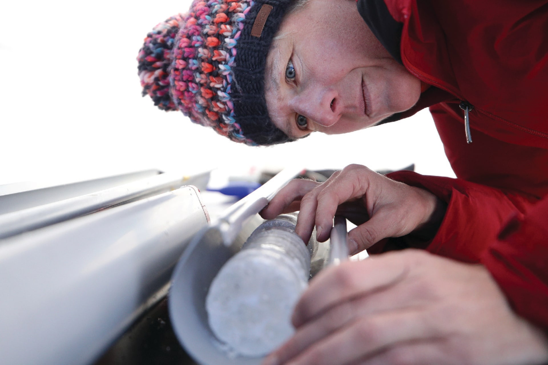 Glaciologist Andrea Fischer examines an ice core from an Austrian glacier