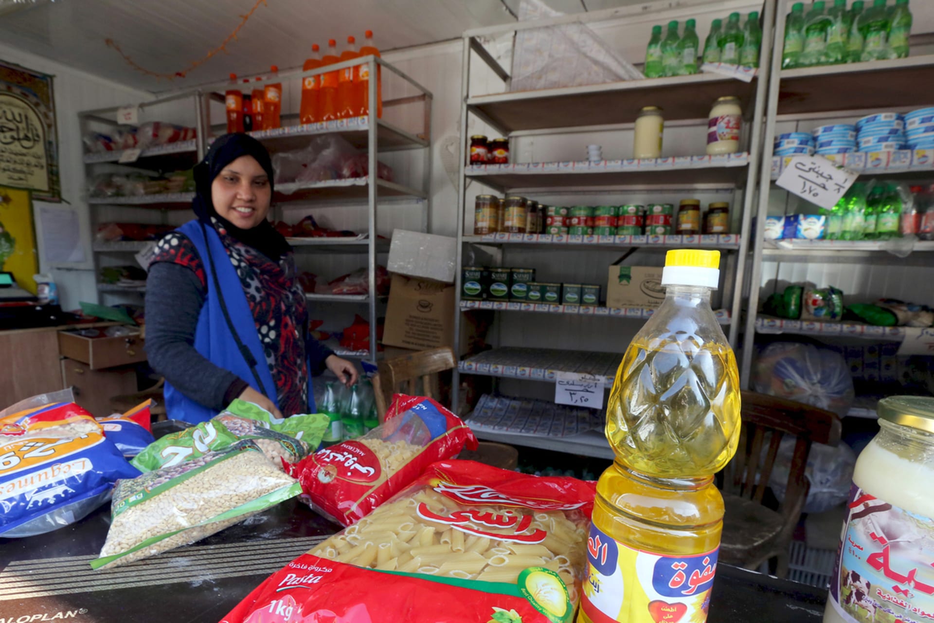 A photo showing a worker selling subsidized food commodities at a government-run supermarket in Cairo, Egypt, on February 14, 2016.