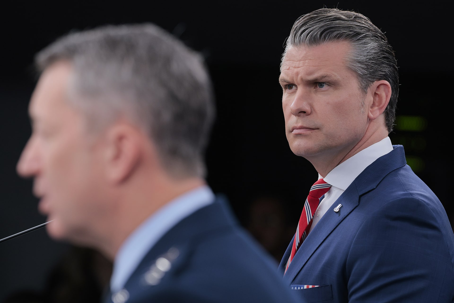 <p>U.S. Secretary of War Pete Hegseth (R) looks on as Chairman of the Joint Chiefs of Staff Gen. Dan Caine speaks during a press briefing at the Pentagon on May 05, 2026 in Arlington, Virginia.</p>
