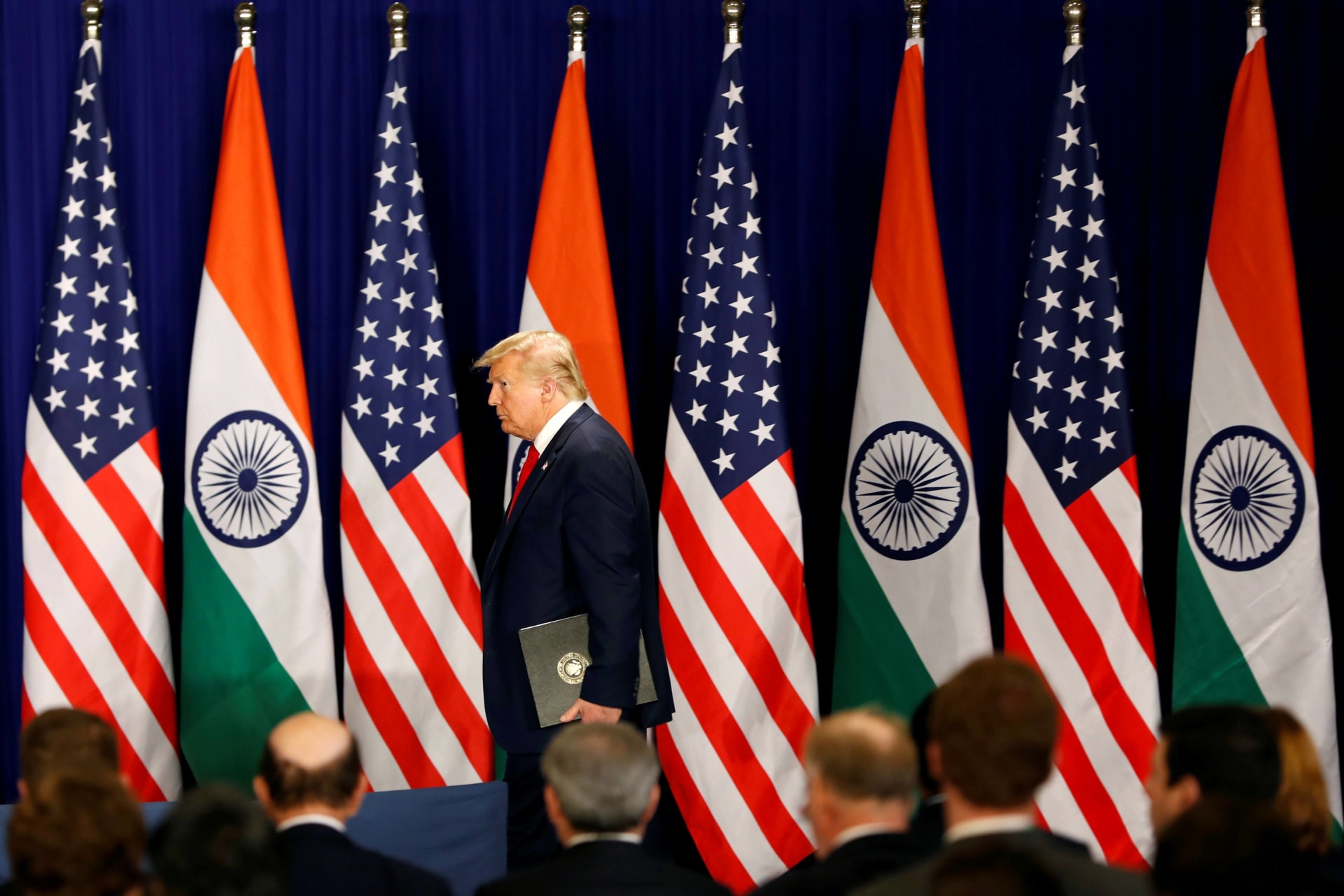 U.S. President Donald Trump arrives for a news conference