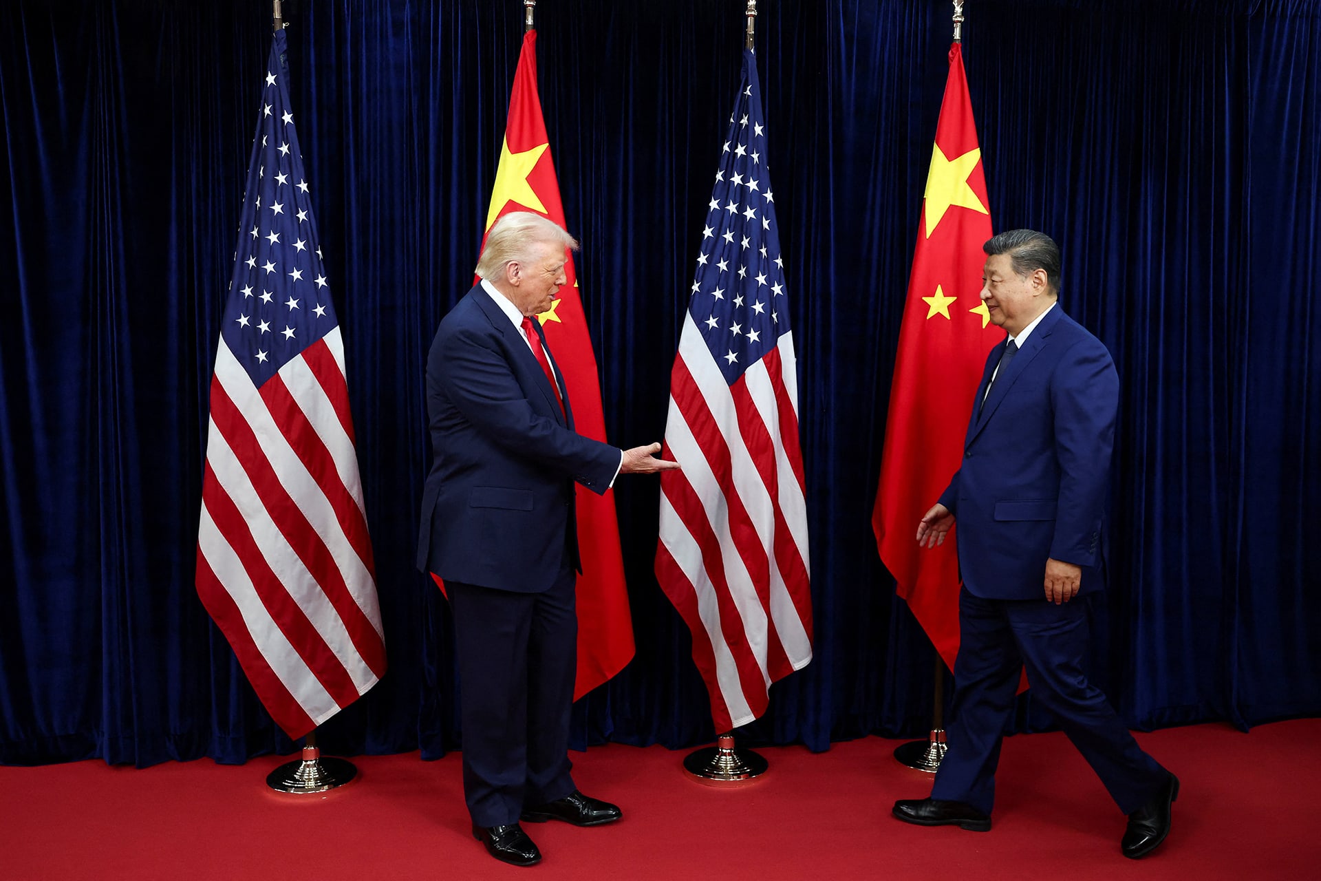 Trump and Xi shake hands on sidelines of APEC 2025 in Busan, South Korea.