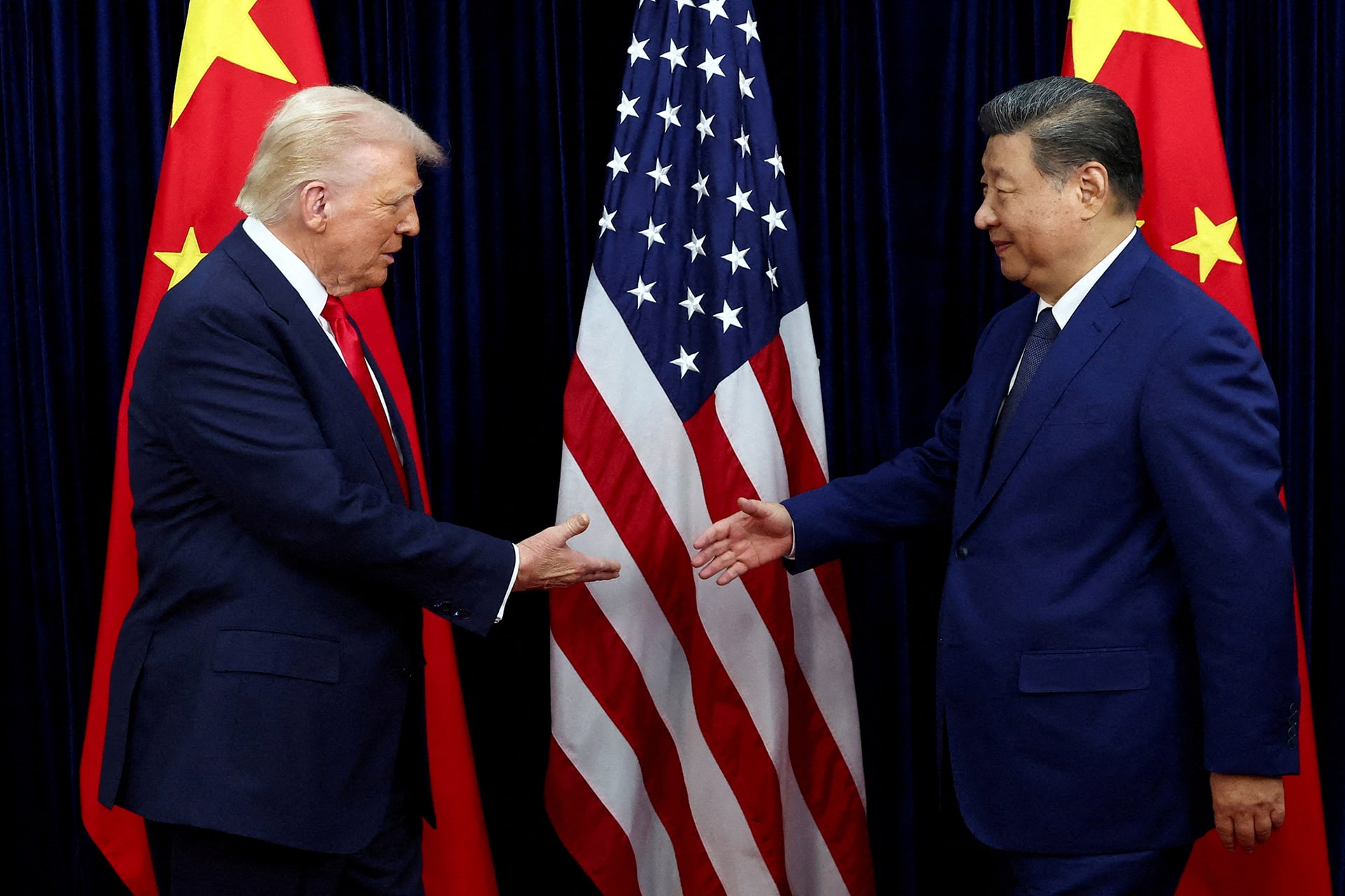 <p>U.S. President Donald Trump shakes hands with Chinese President Xi Jinping at a bilateral meeting in Busan, South Korea, October 30, 2025. </p>
