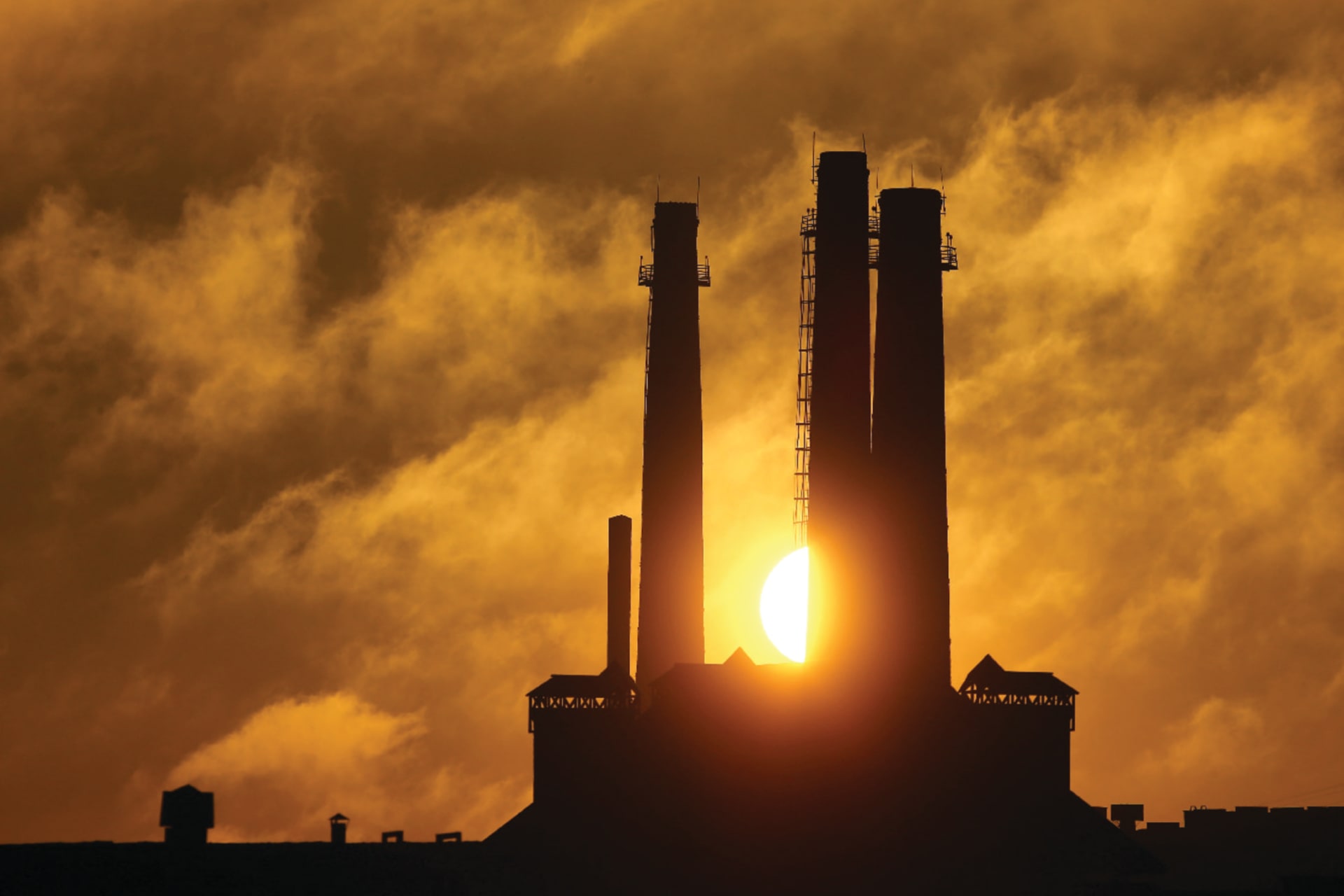 Smokestacks at sunset