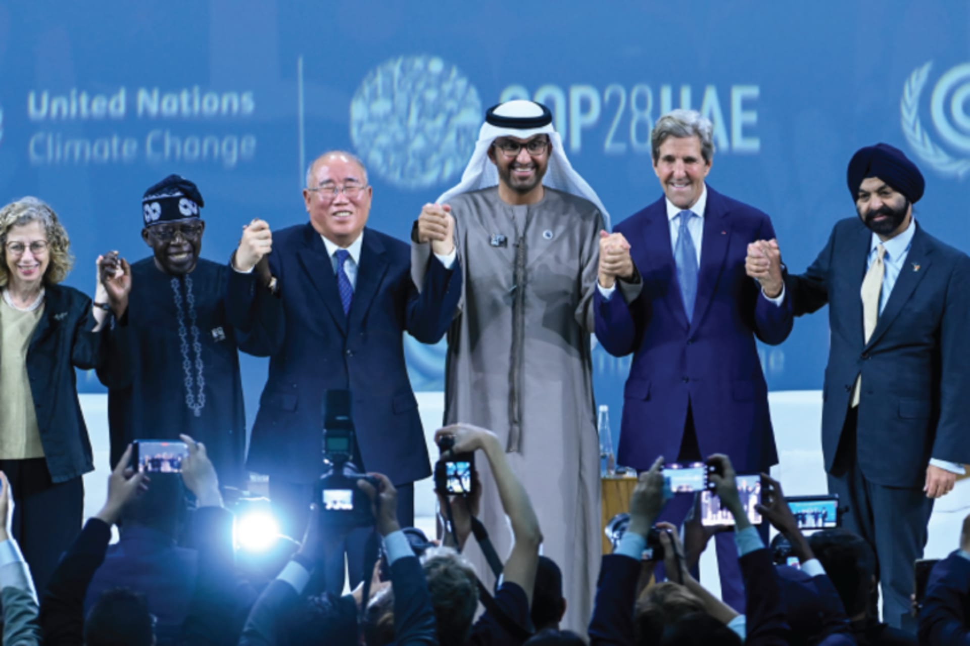 World leaders join hands in a show of unity at the UNFCCC’s 28th Conference of the Parties (COP28) on December 2, 2023, in Dubai, United Arab Emirates.