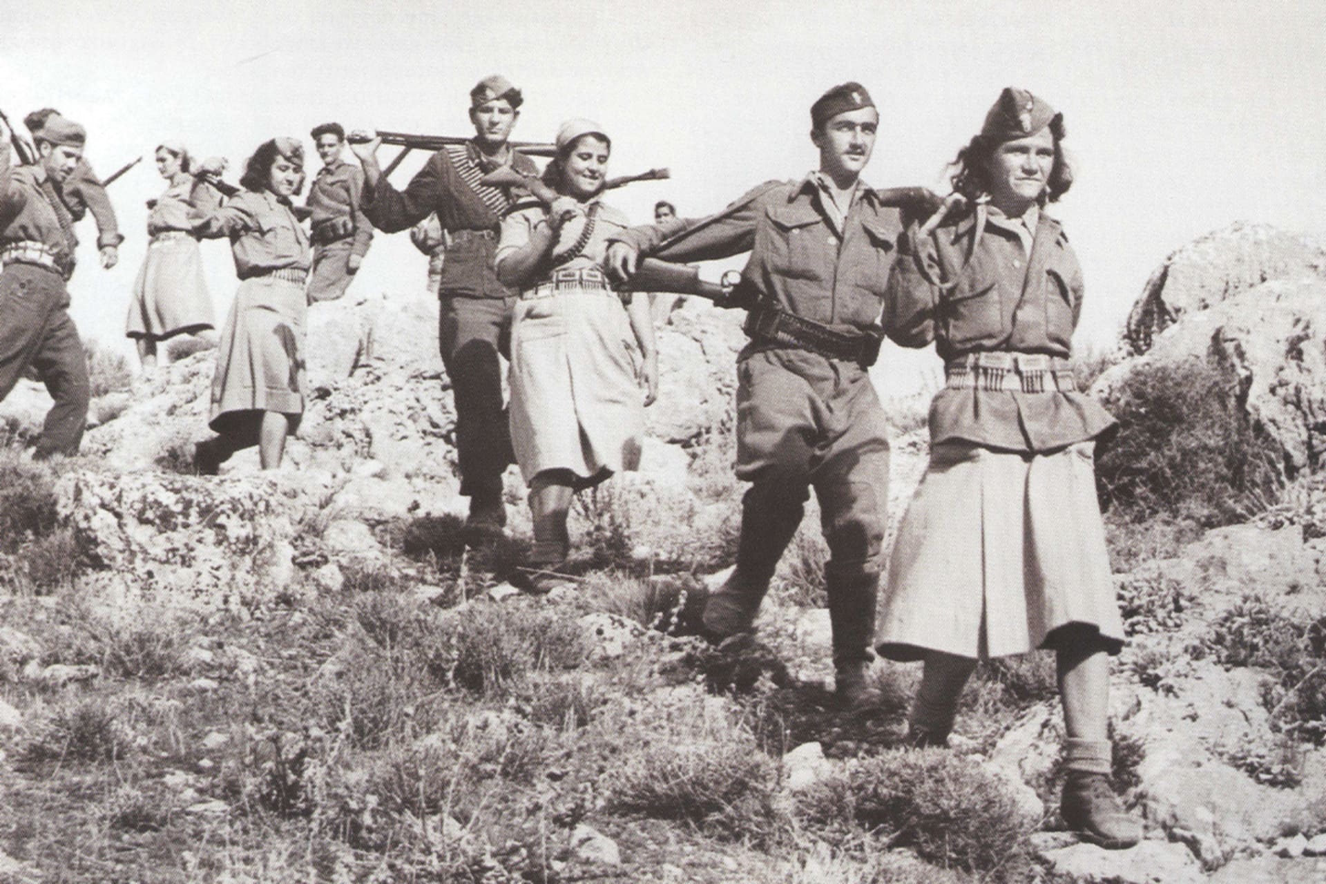 <p>Greek People’s Liberation Army (ELAS) guerillas march with weapons in 1943.</p>