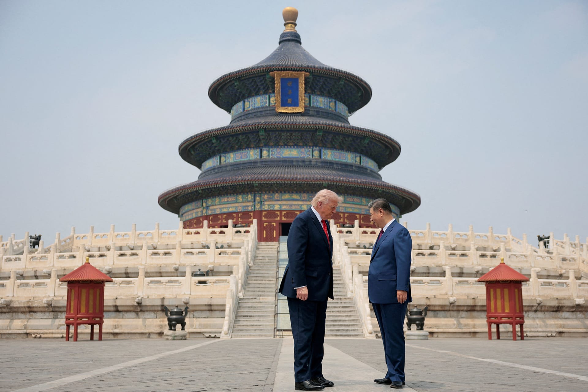 U.S. President Donald Trump and Chinese President Xi Jinping stand together as they tour the Temple of Heaven in Beijing, China, May 14, 2026.