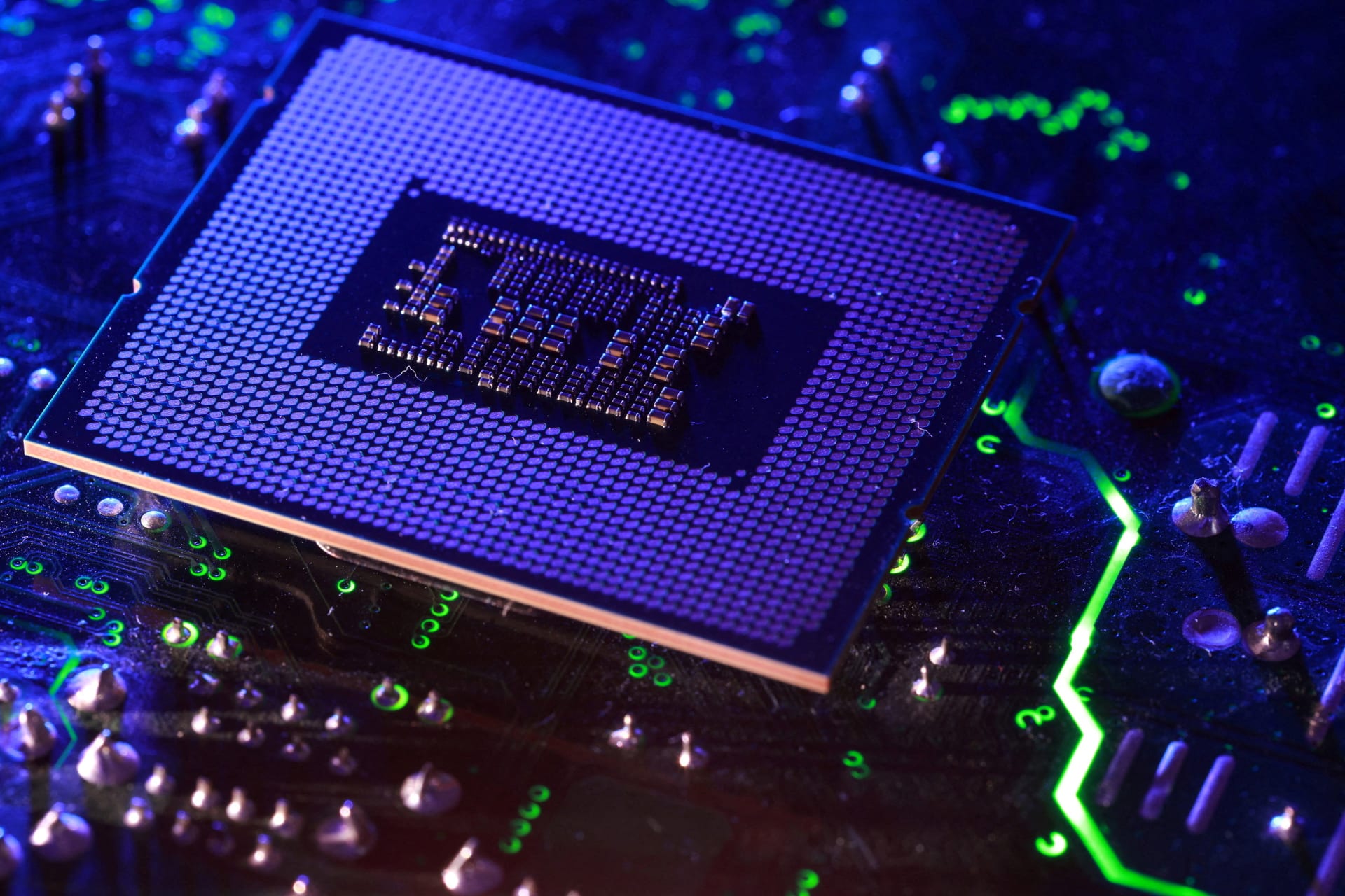 Computer motherboard and Intel chip appear in this illustration taken August 25, 2025. REUTERS/Dado Ruvic/Illustration