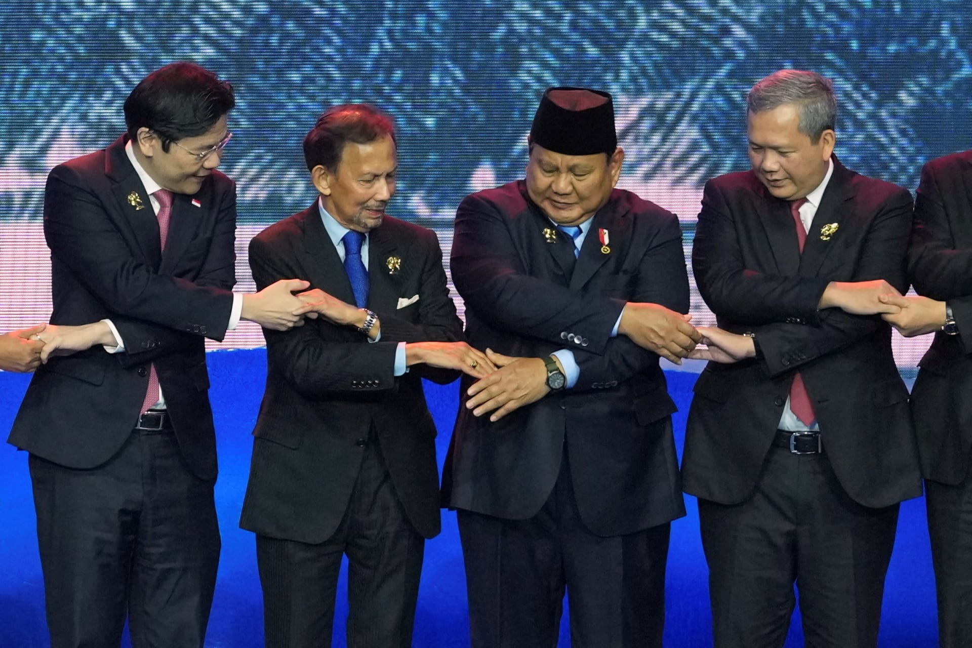 <p>From left to right: Singapore’s Prime Minister Lawrence Wong, Brunei’s Sultan Hassanal Bolkiah, Indonesia’s President Prabowo Subianto, and Cambodia’s Prime Minister Hun Manet hold hands for a group photo during the opening ceremony of the 48th ASEAN Summit and Related Meetings, in Cebu, Philippines, on May 8, 2026.</p>