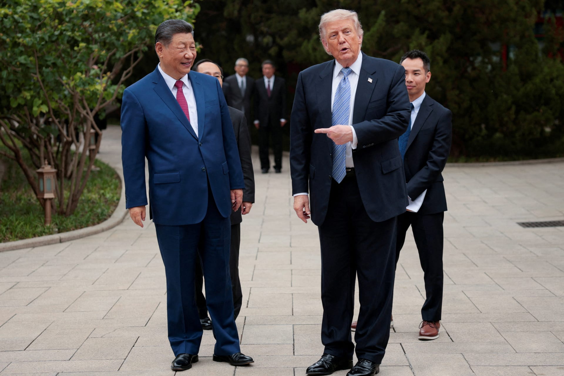 U.S. President Donald Trump gestures towards Chinese President Xi Jinping while leaving after a visit to the Zhongnanhai Garden in Beijing, China, May 15, 2026. REUTERS/Evan Vucci/Pool/File Photo/File Photo