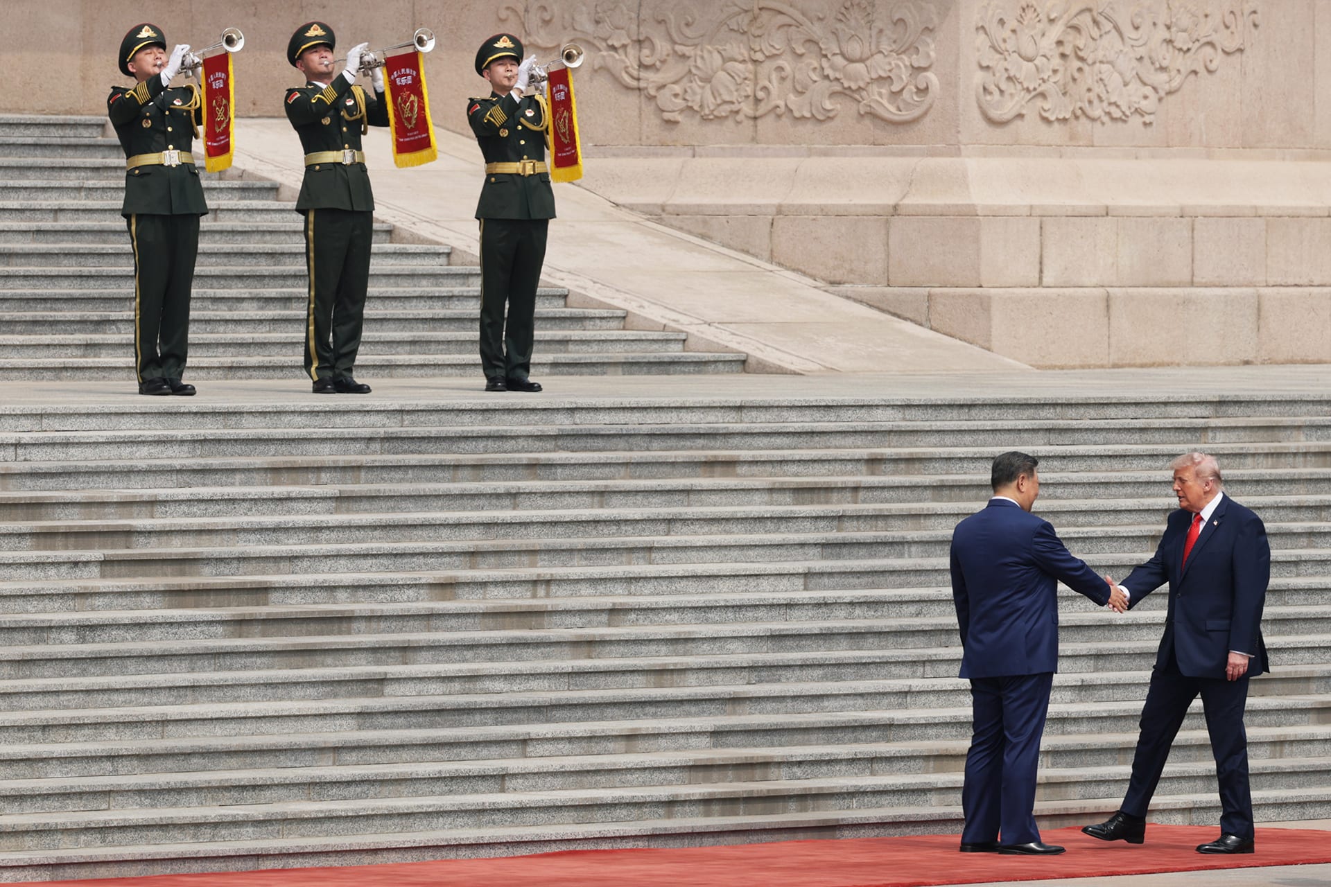 <p>U.S. President Donald Trump is greeted by Chinese President Xi Jinping during a welcome ceremony on May 14, 2026, in Beijing, China.</p>
