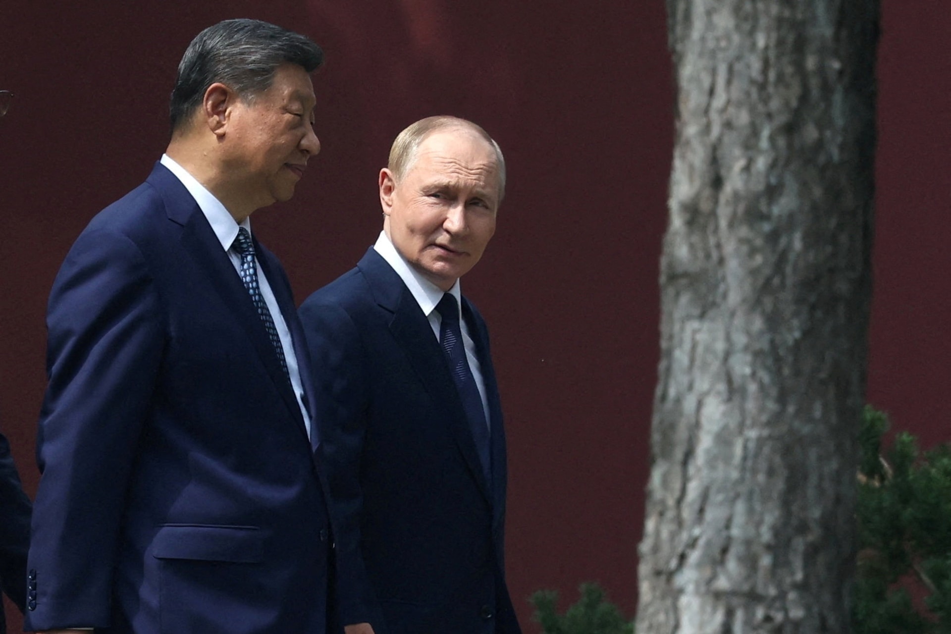 FILE PHOTO: Russian President Vladimir Putin meets with Chinese President Xi Jinping in Beijing