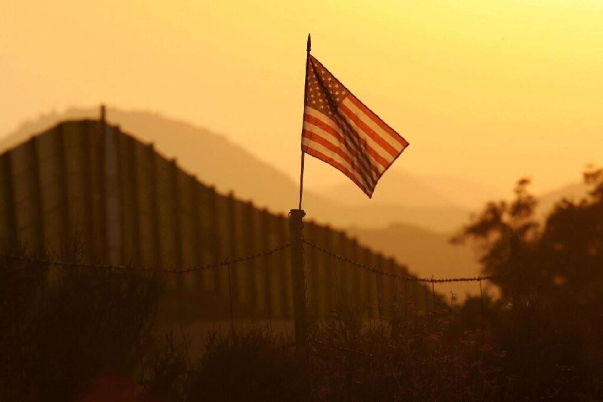 The American Flag at sunset near the U.S. Mexico Border.