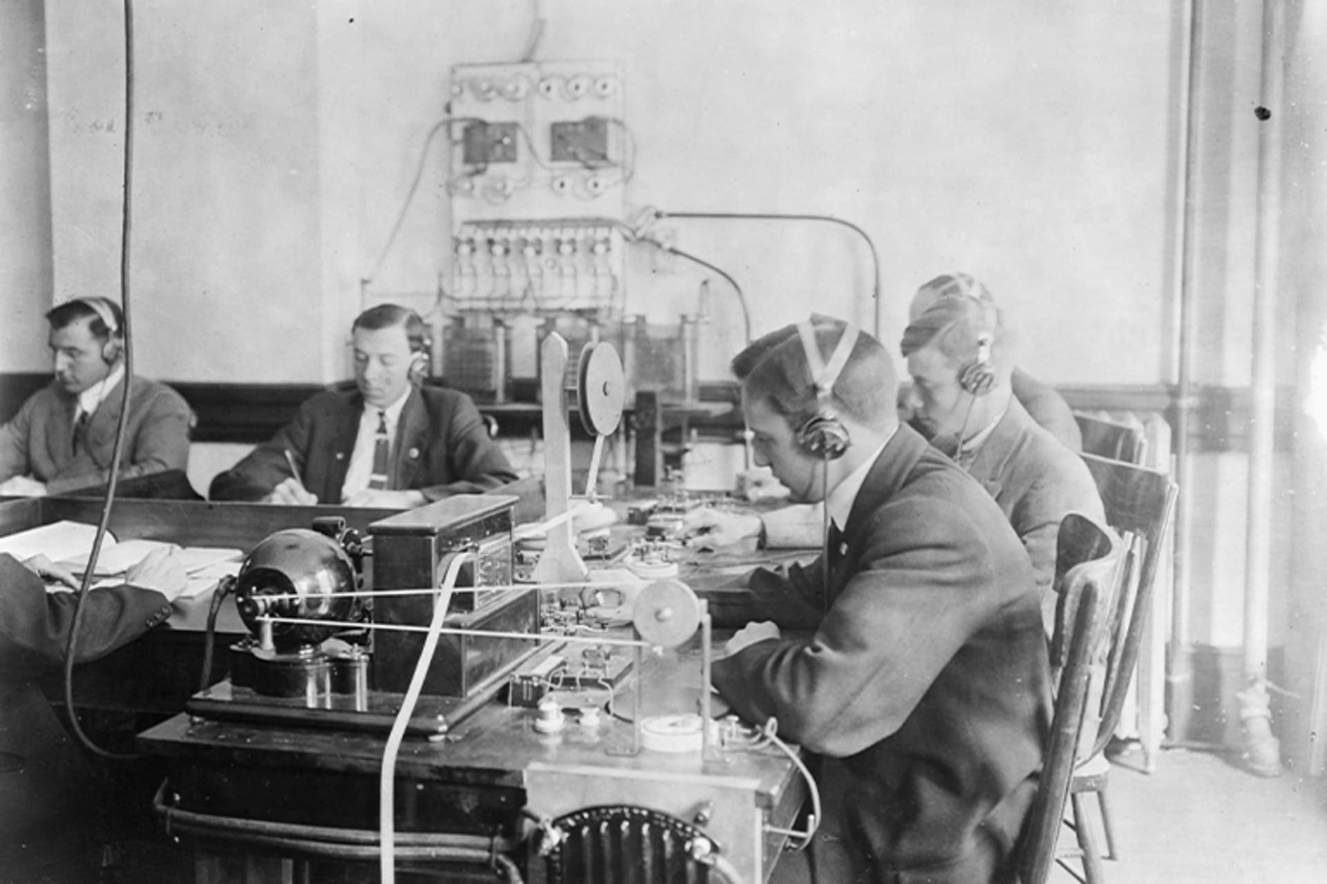 Students practicing at a Marconi wireless school in New York, circa 1912.