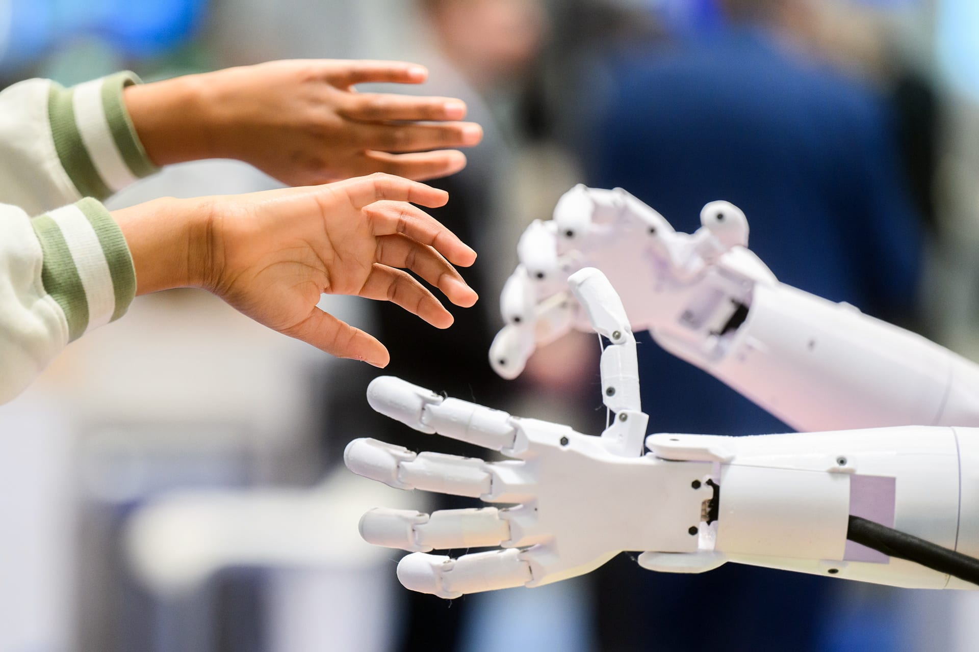 <p>A child communicates with a robot from “pib@school” at the Hannover Messe 2025 industrial trade fair in Hanover, Germany. </p>
