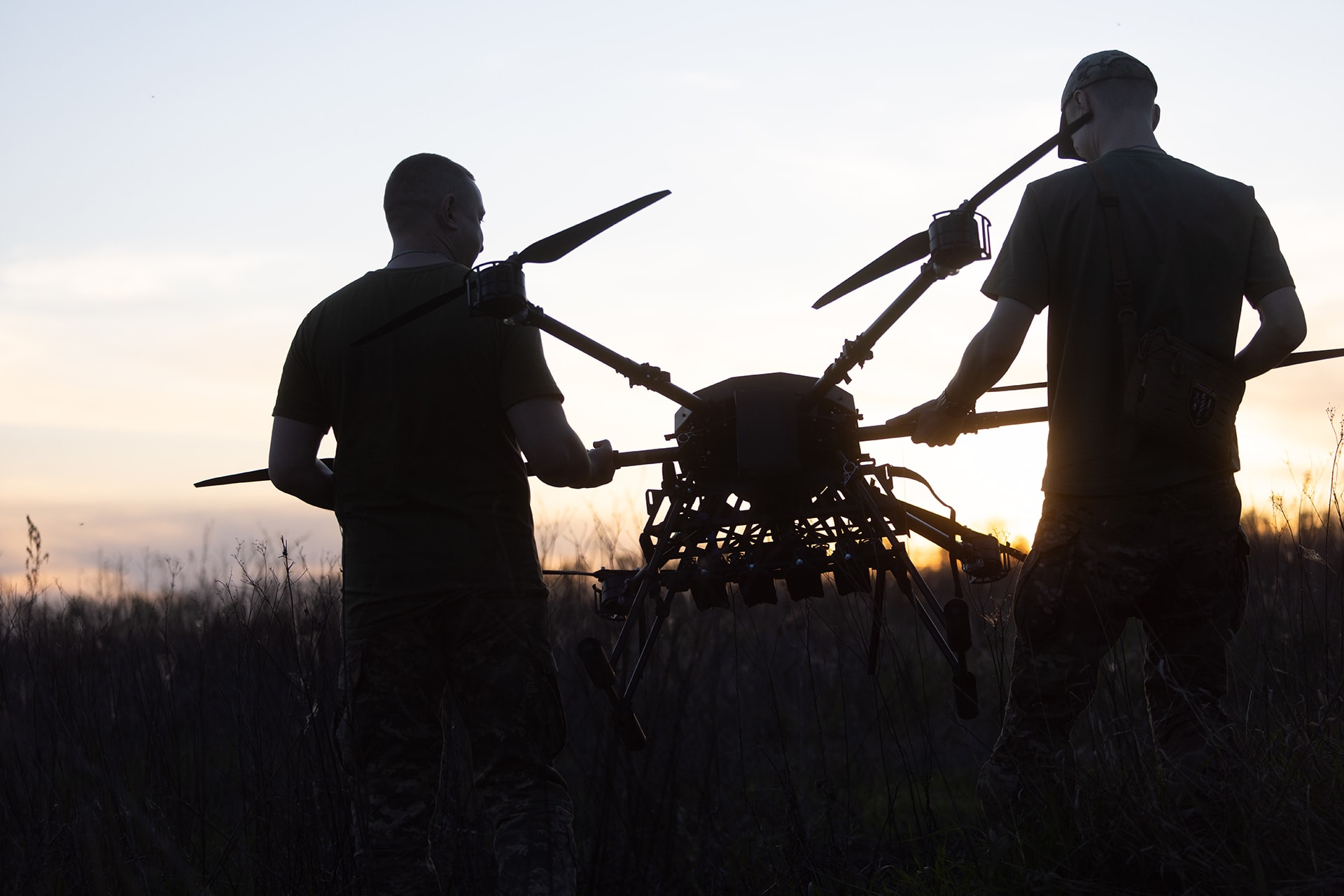 <p>Ukrainian soldiers of the 127th Heavy Mechanized Brigade carry a Heavy Shot UAV across a field on May 8, 2026, in Kharkiv Oblast, Ukraine. </p>
