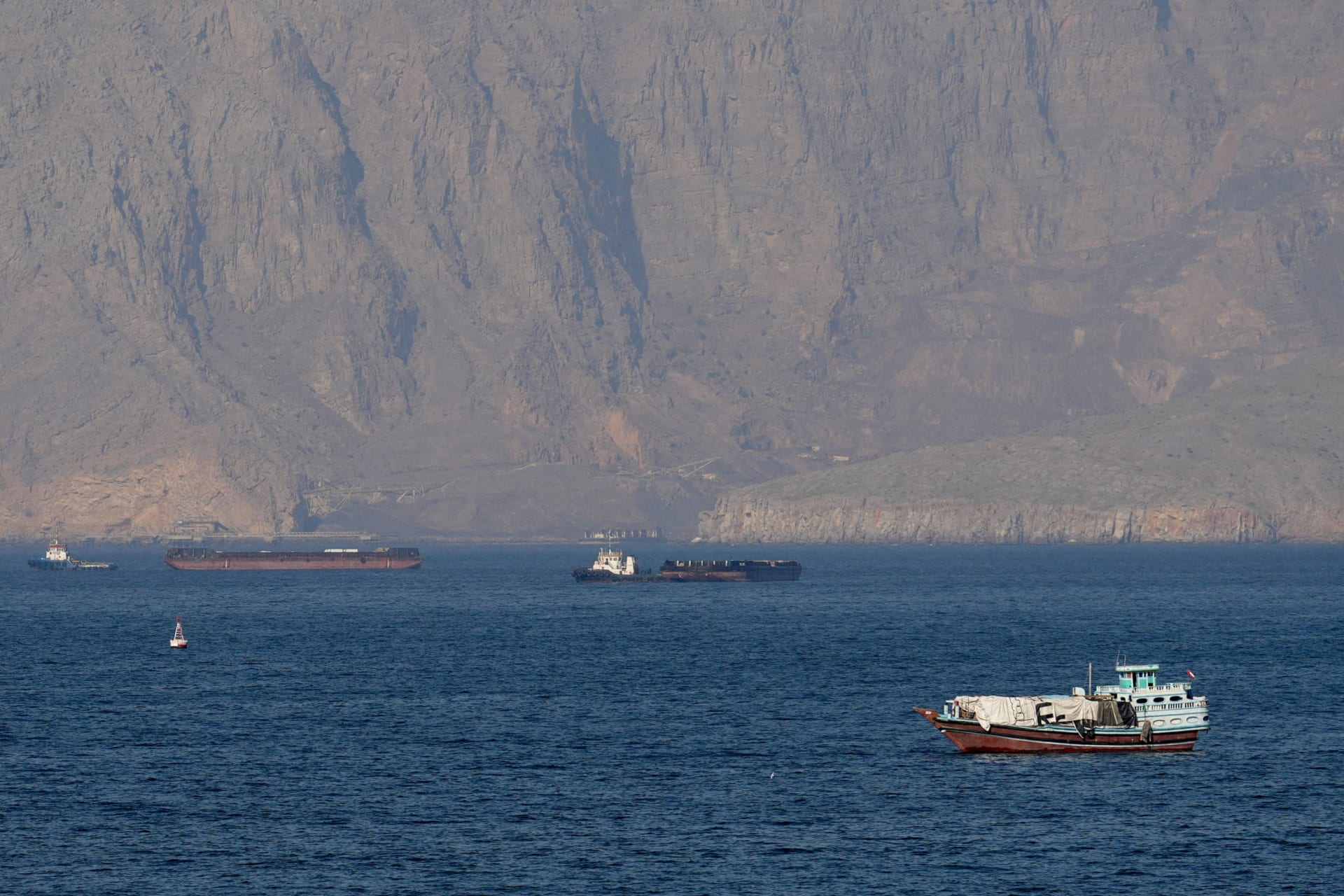 <p>Ships and tankers in the Strait of Hormuz off the coast of Musandam, Oman, April 18, 2026. </p>
