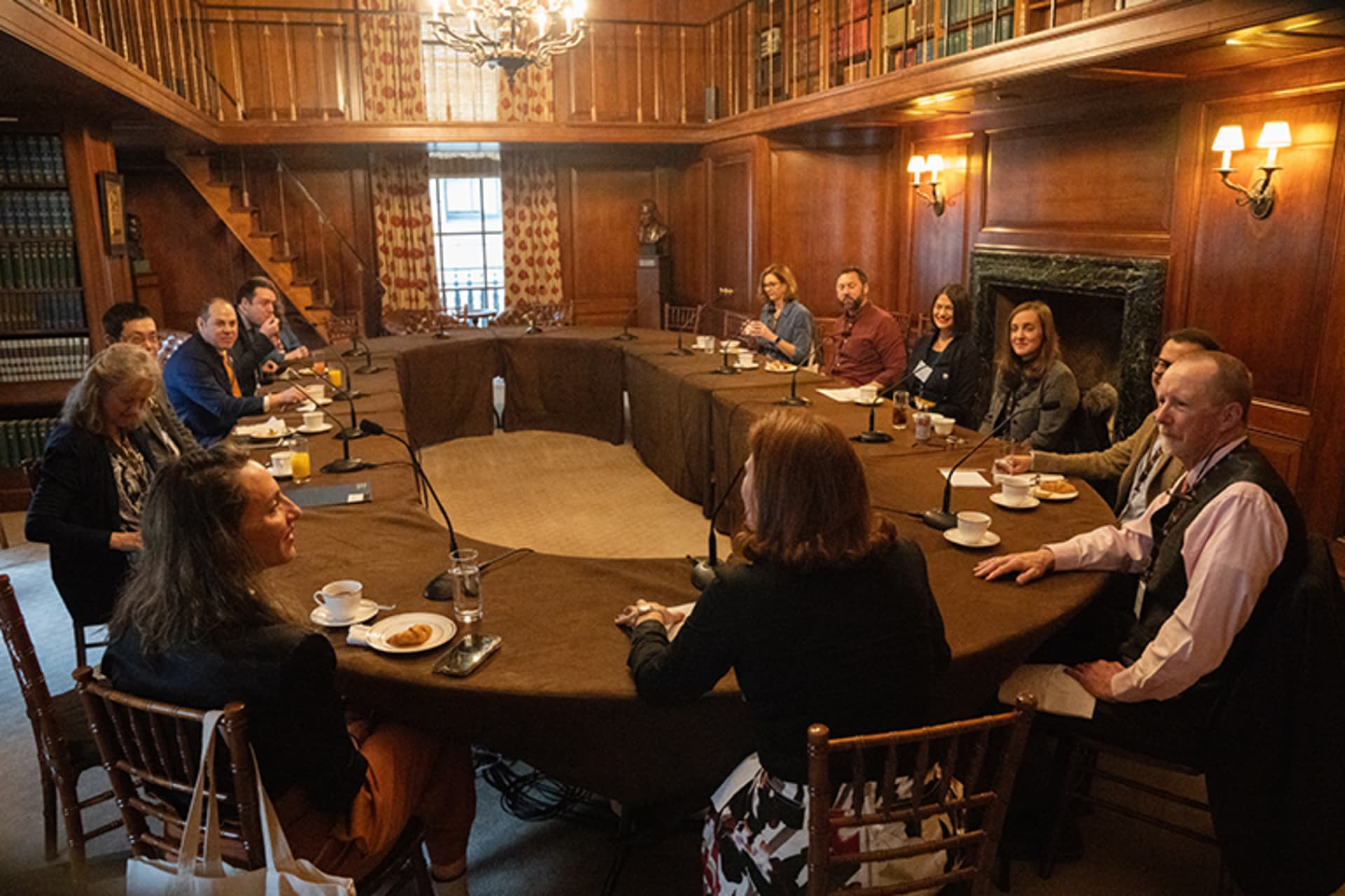 Attendees sitting around a table at a CFR Education Ambassador Program meeting in the Council on Foreign Relation's New York office.