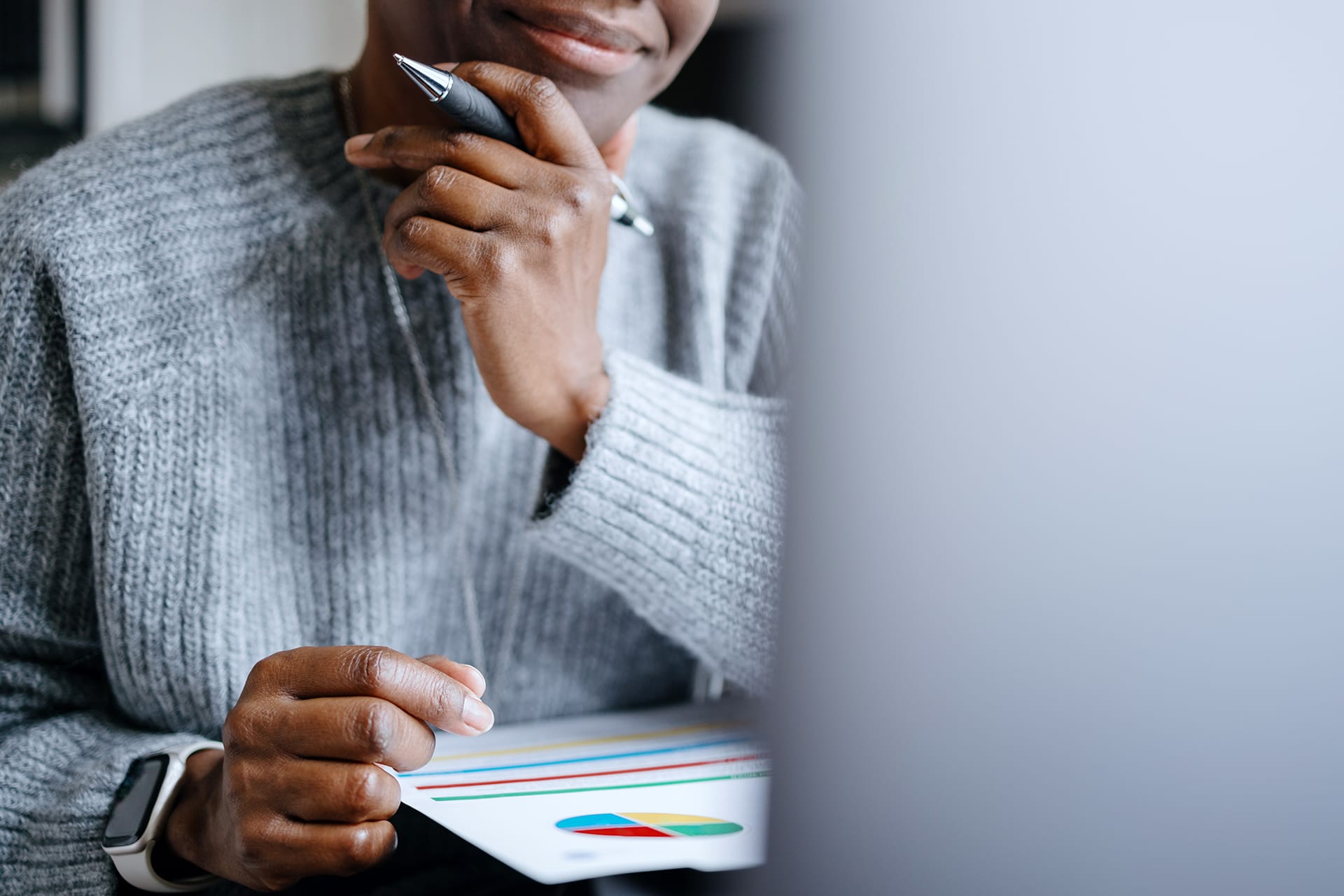 Woman Works on Laptop at Home