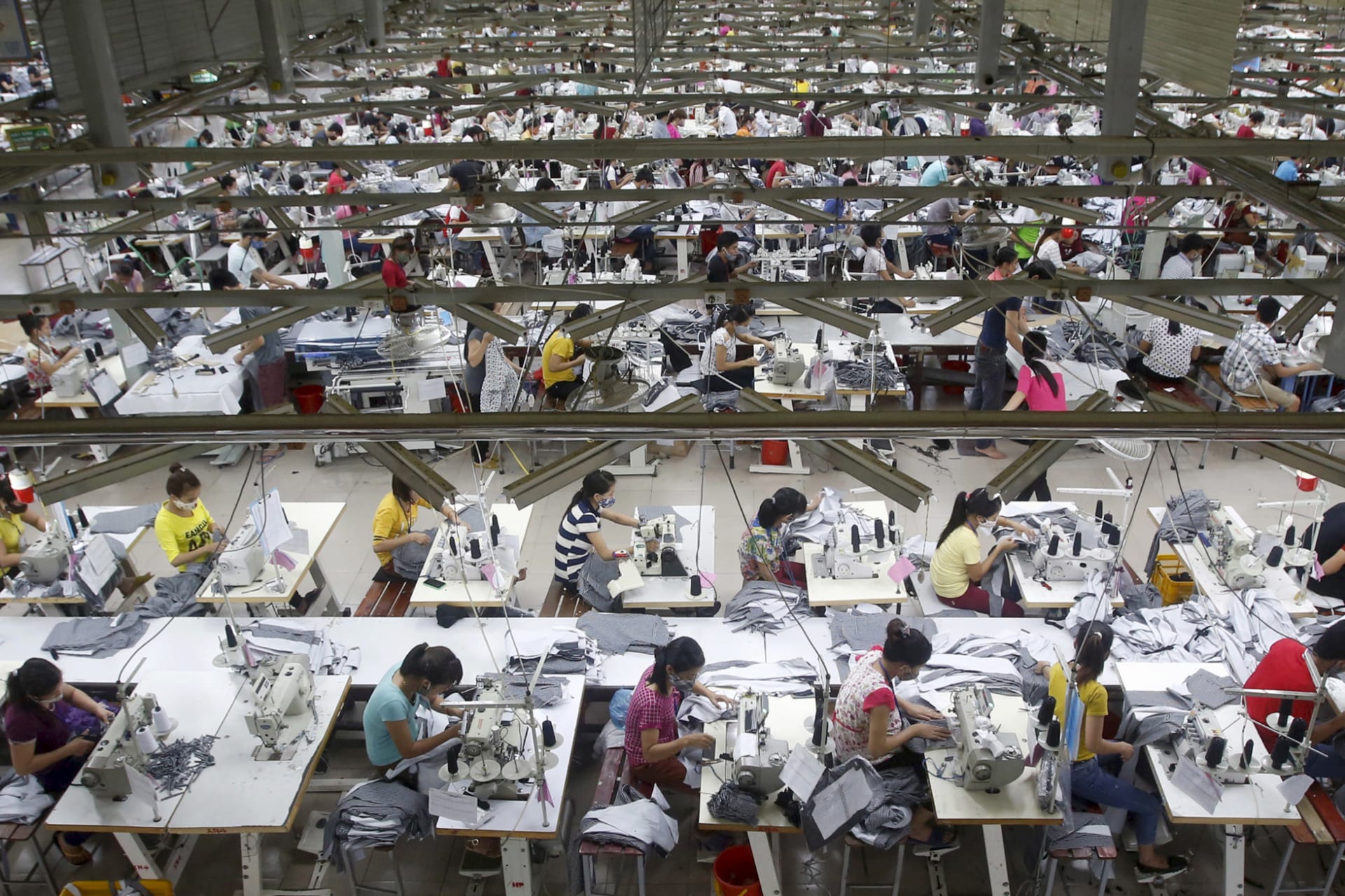 Labourers work at a garment factory in Bac Giang province, near Hanoi