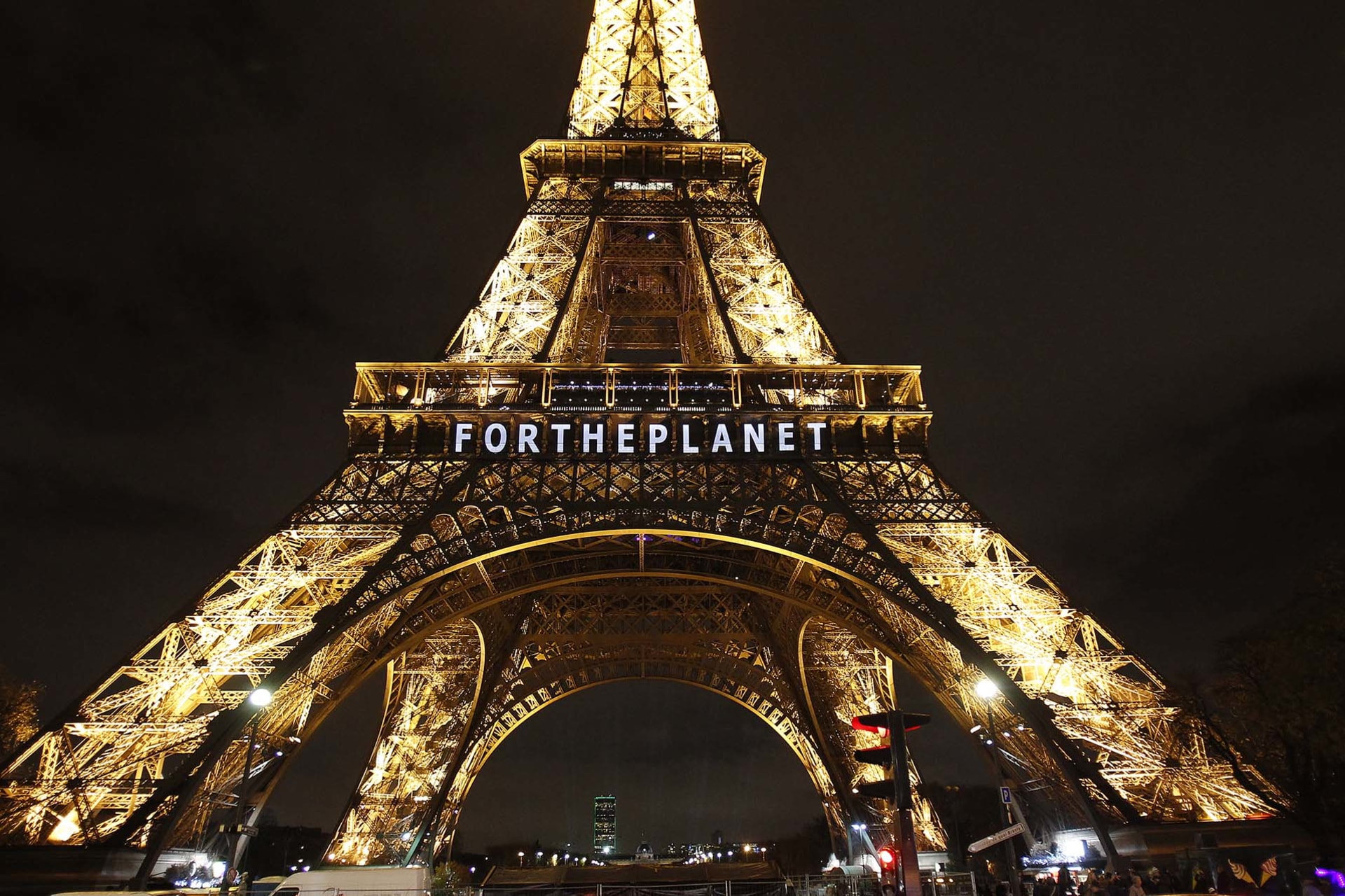 The Eiffel Tower Displays Messages As Part Of 21st Session Of Conference On Climate Change COP21 In Paris which features the visual display by Yann Toma called HUMAN ENERGY.
