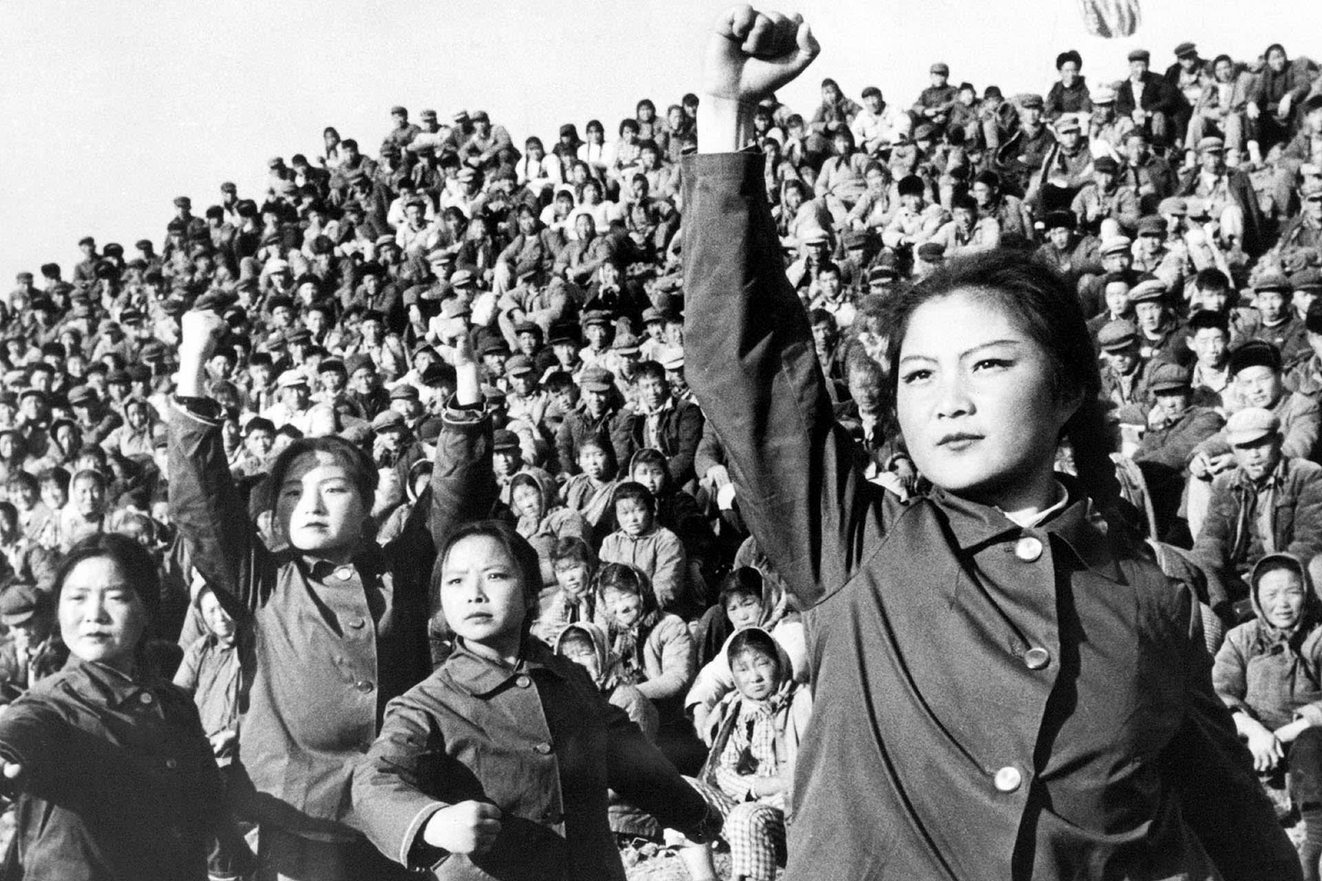 China: Enthusiastic 'Red Guards' wave copies of Mao Zedong's 'Little Red Book' (Quotations from Chairman Mao Tse-tung, Mao Zhuxi Yulu), c. 1966