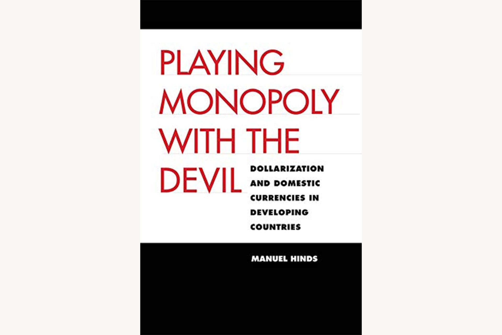 A black and white book cover that reads, "Playing Monopoly With the Devil: Dollarization and Domestic Currencies in Developing Countries".