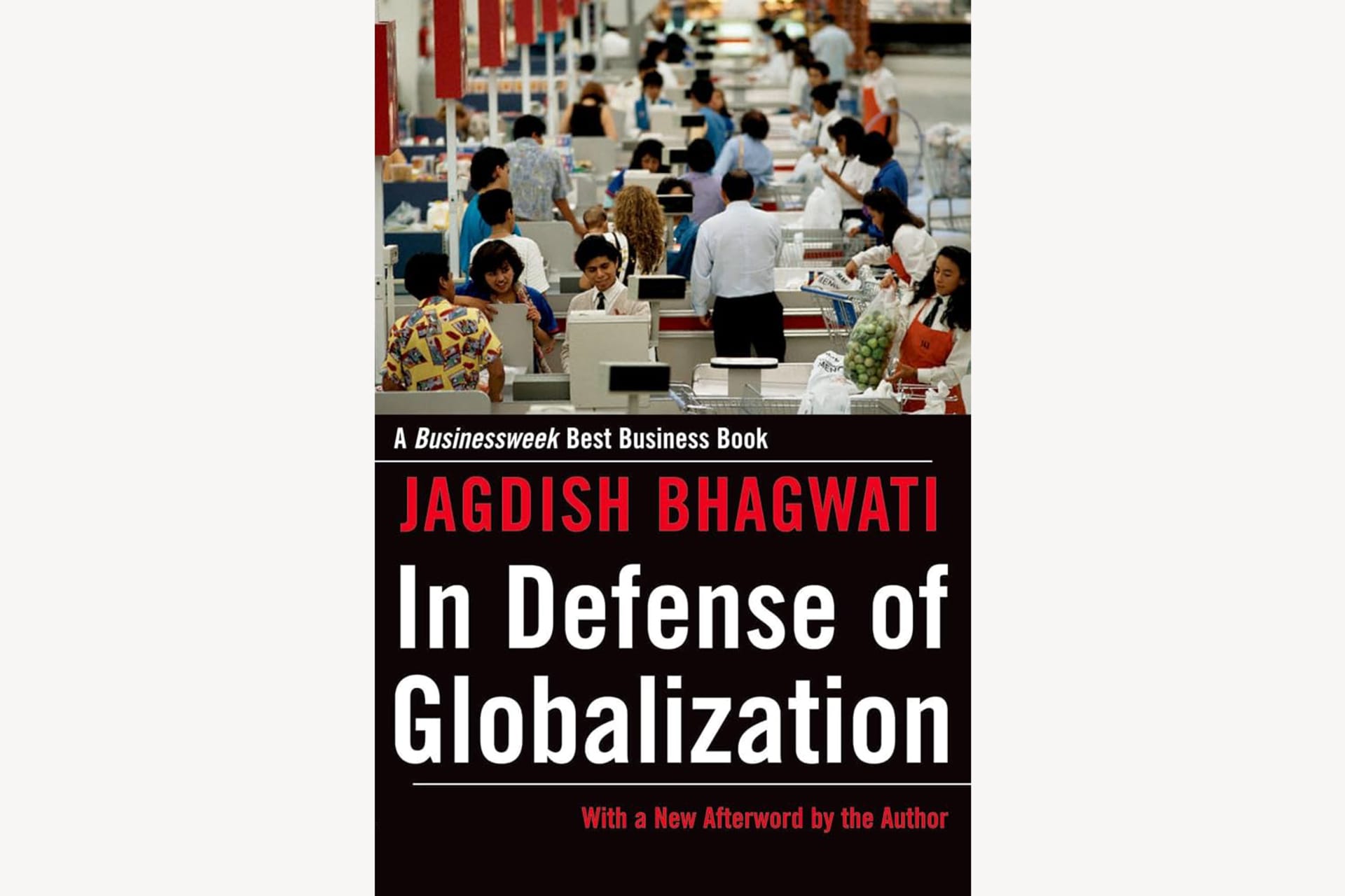 A book cover with a photo of people working in an office on the top half and text on the bottom half that reads, "In Defense of Globalization".