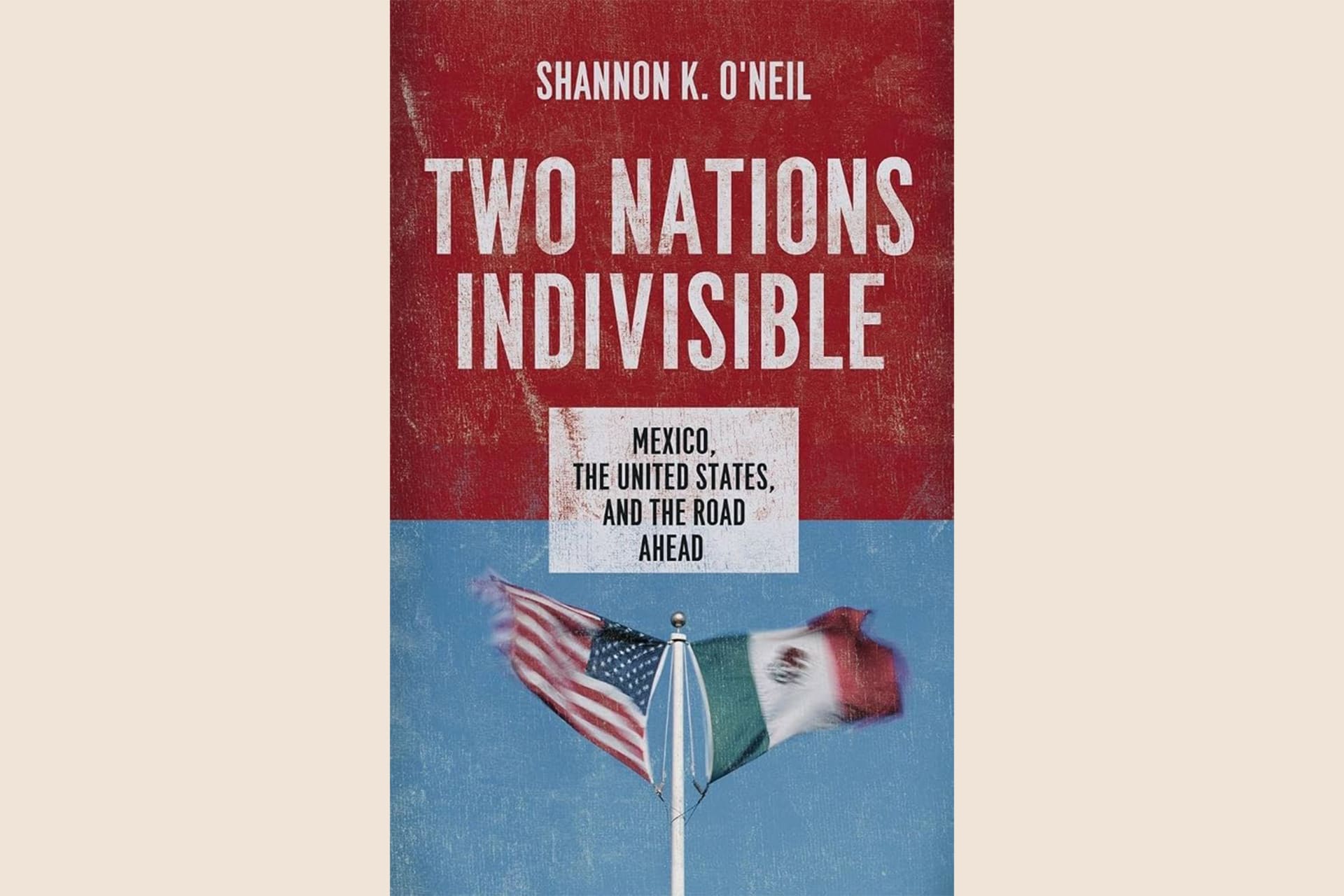 A book cover showing the American and Mexican flags waving next to one another in the wind. The text reads, "Two Nations Indivisible: Mexico, the United States, and the Road Ahead".