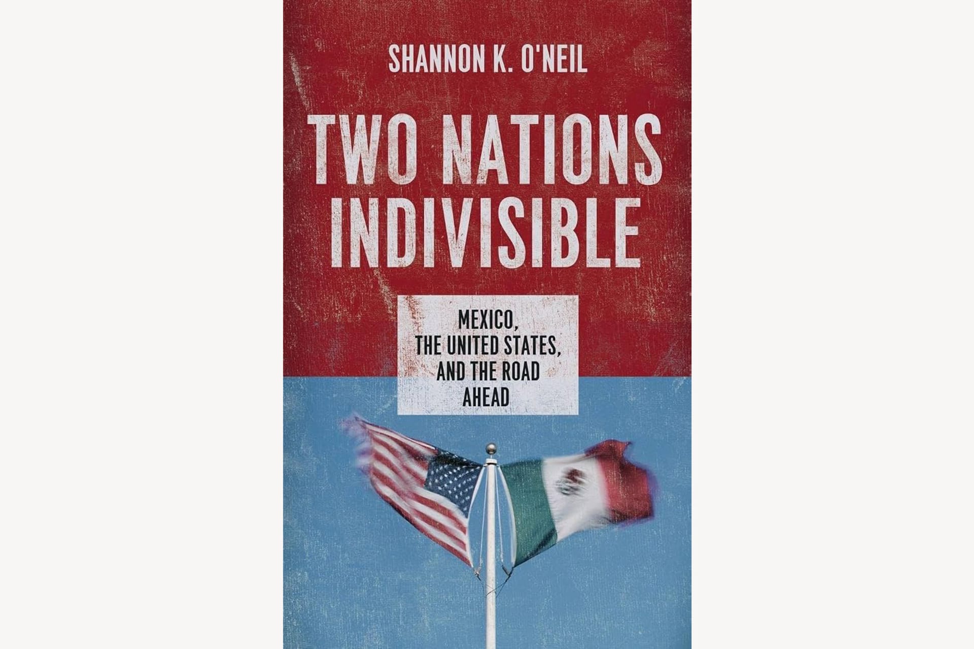 A book cover showing the American and Mexican flags waving next to one another in the wind. The text reads, "Two Nations Indivisible: Mexico, the United States, and the Road Ahead".