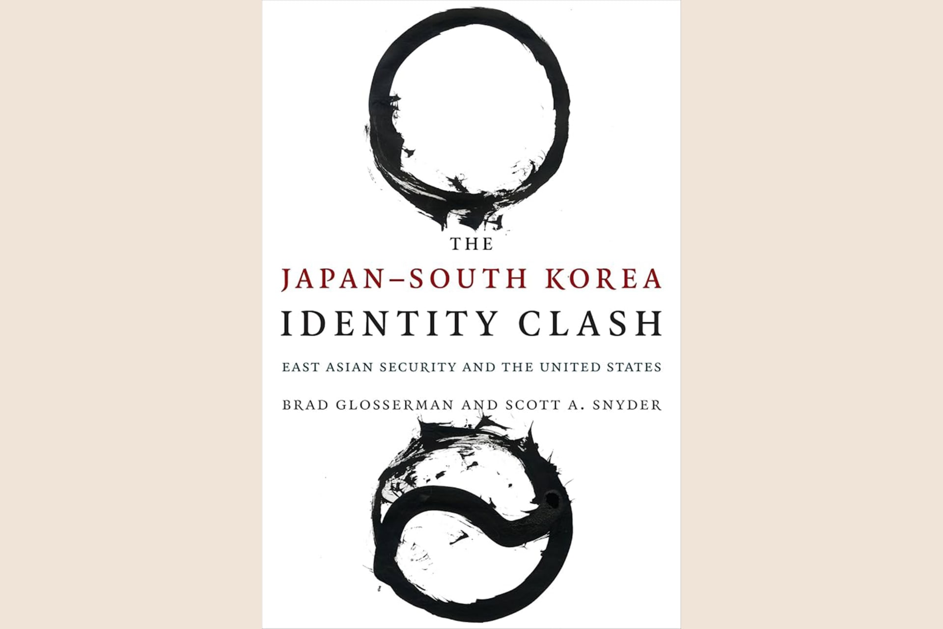 A book cover showing two dark rings above and below the title. The text reads, "The Japan-South Korea Identity Clash: East Asian Security and the United States".