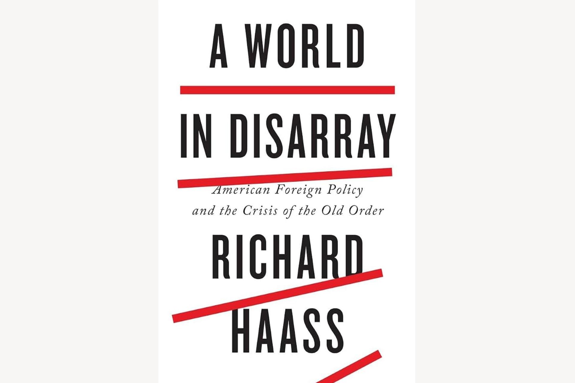 A book cover with four red lines, each consecutive one slightly less straight and centered than the previous. The text reads, "A World in Disarray: American Foreign Policy and the Crisis of the Old Order".
