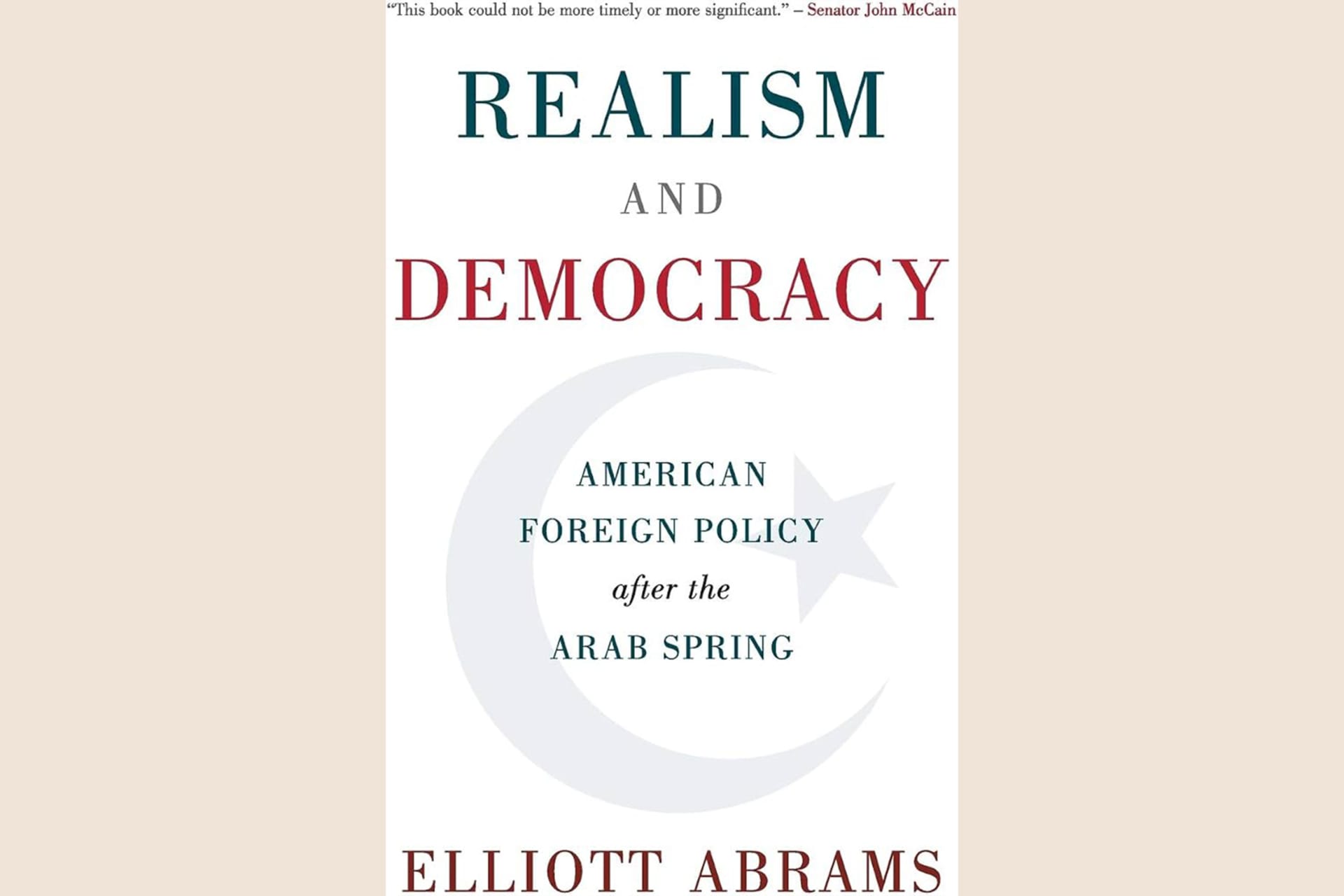 A book cover showing a light colored moon and star and text that reads, "Realism and Democracy: American Foreign Policy After the Arab Spring".