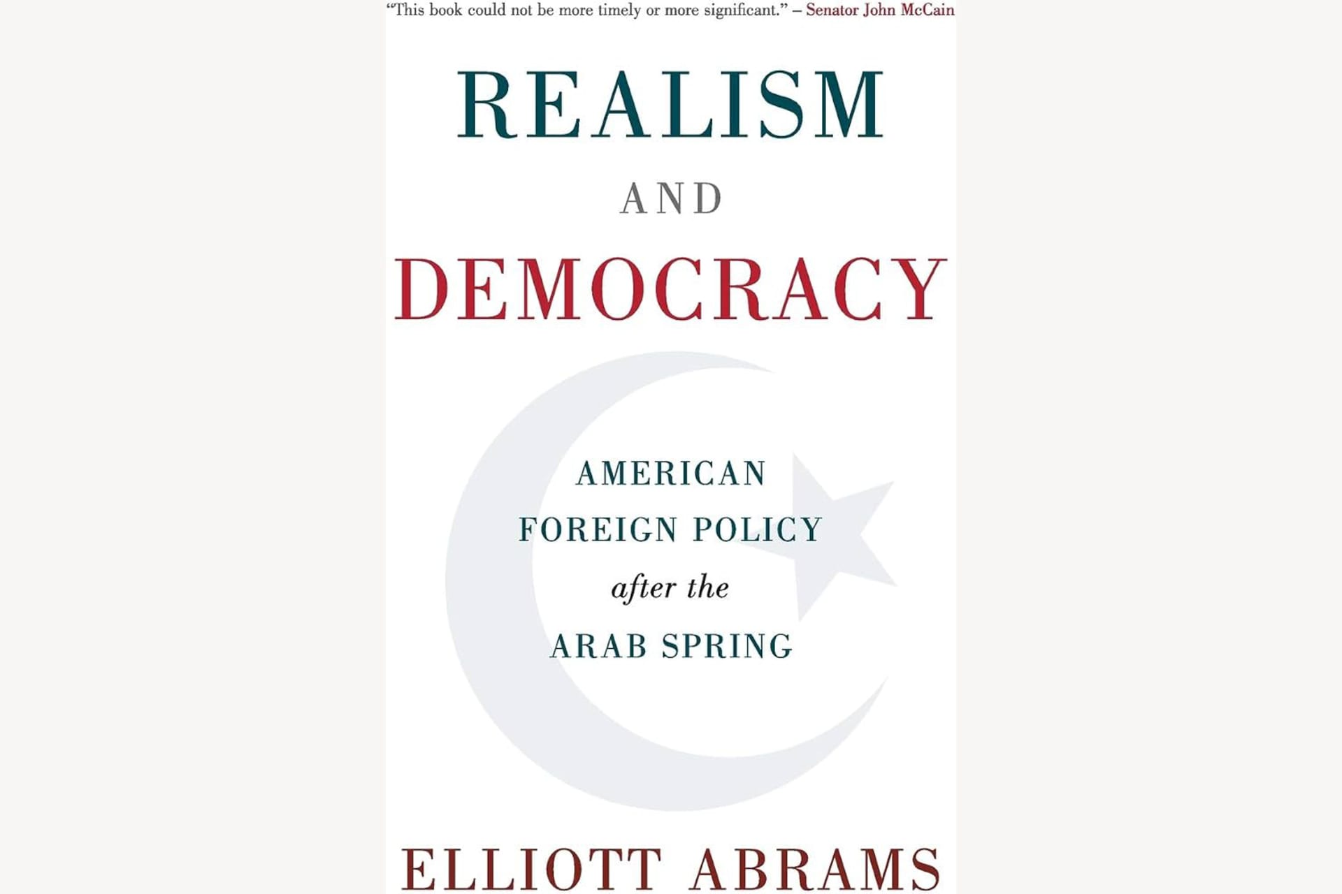 A book cover showing a light colored moon and star and text that reads, "Realism and Democracy: American Foreign Policy After the Arab Spring".